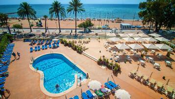 Outdoor pool, pool umbrellas, pool loungers