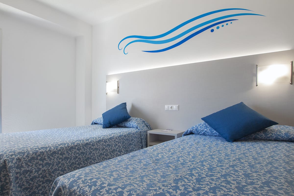 triple room, terrace | in-room safe, desk, free wifi, bed sheets