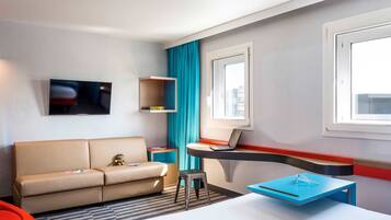 Premium bedding, desk, blackout drapes, soundproofing