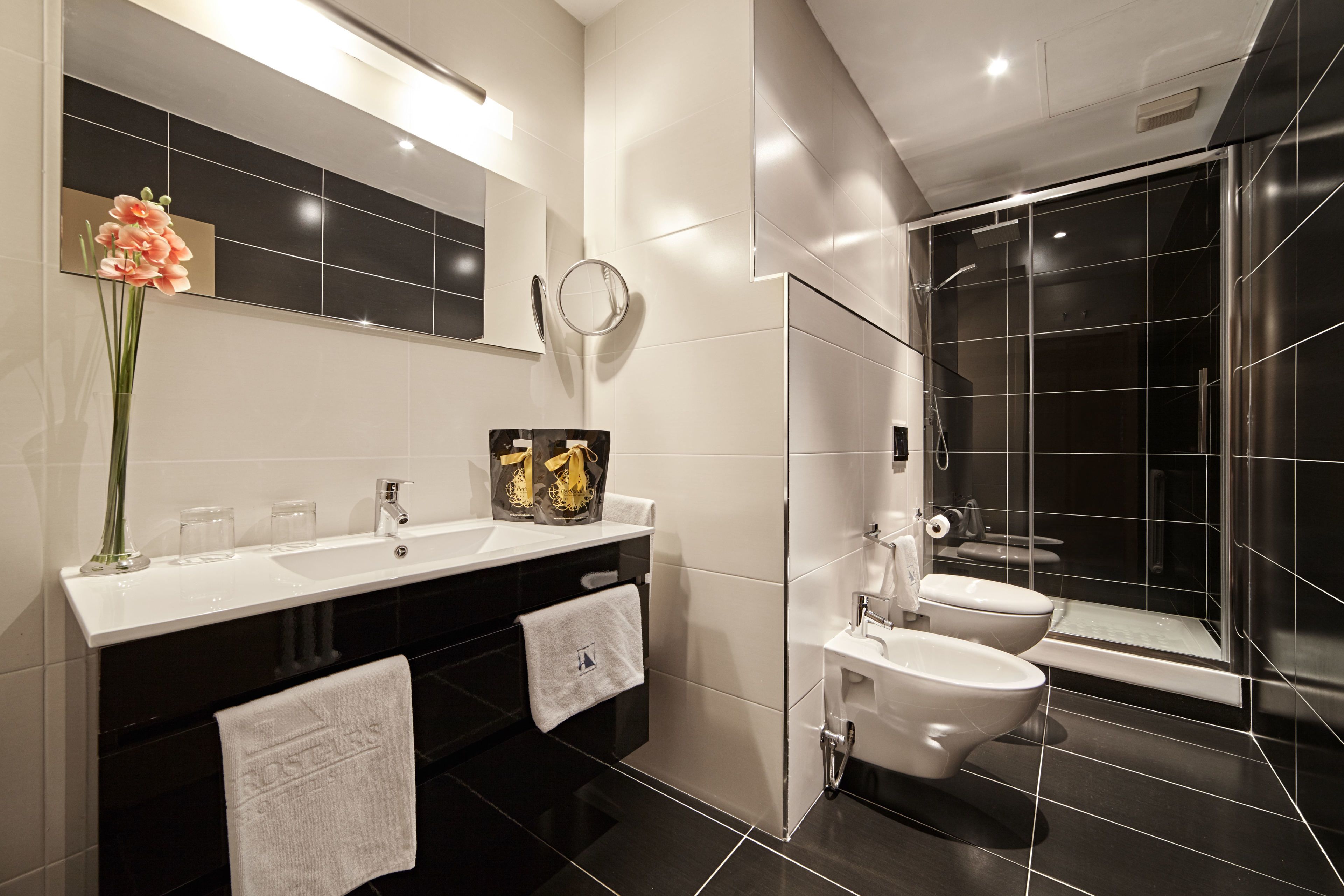 bathtub, eco-friendly toiletries, hair dryer, bidet