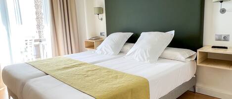 Premium bedding, down comforters, soundproofing, iron/ironing board