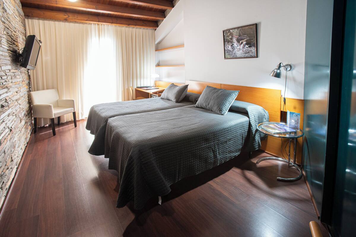 double or twin room | 1 bedroom, in-room safe, desk, blackout curtains