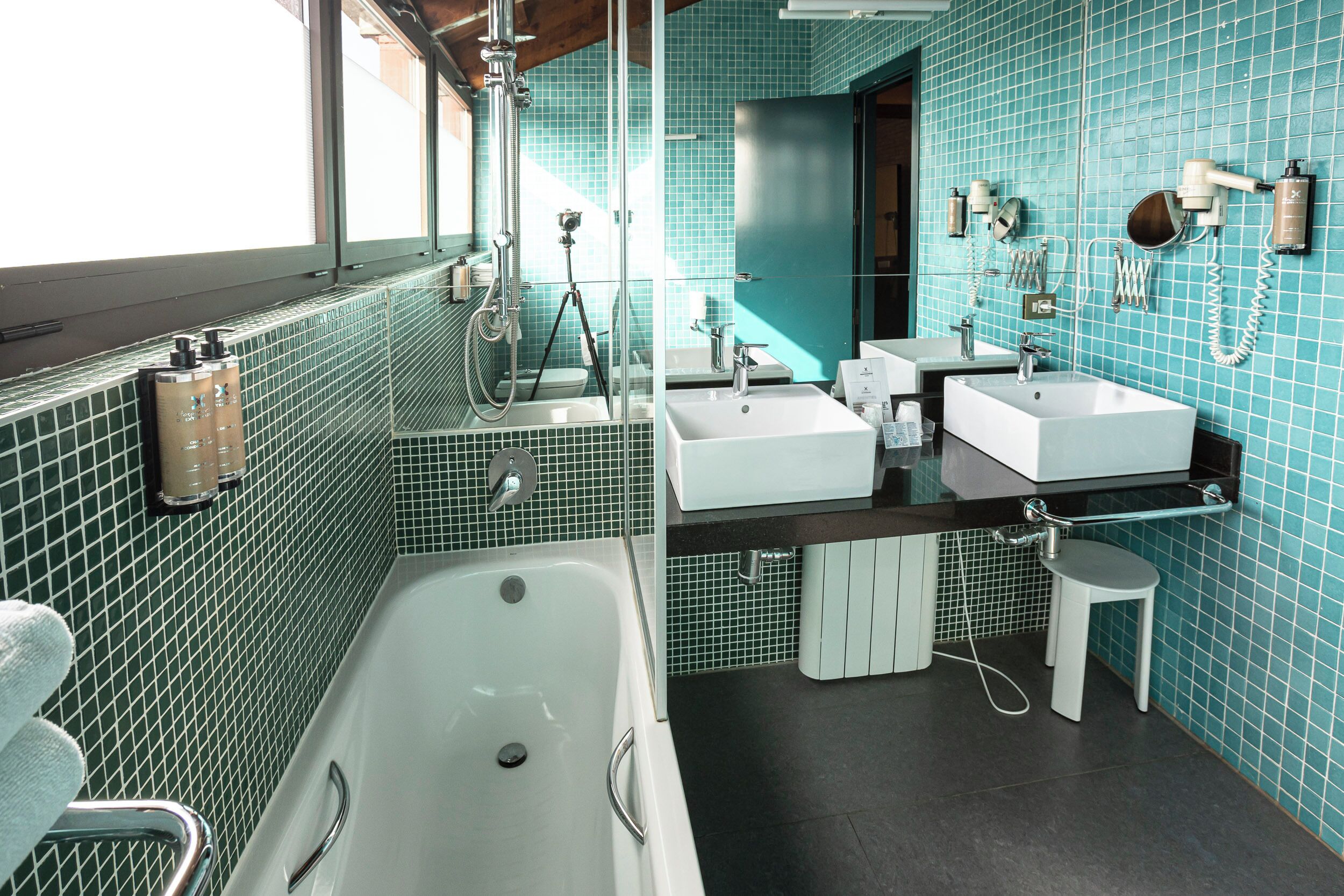 superior double room | bathroom | shower, hair dryer, bidet, towels