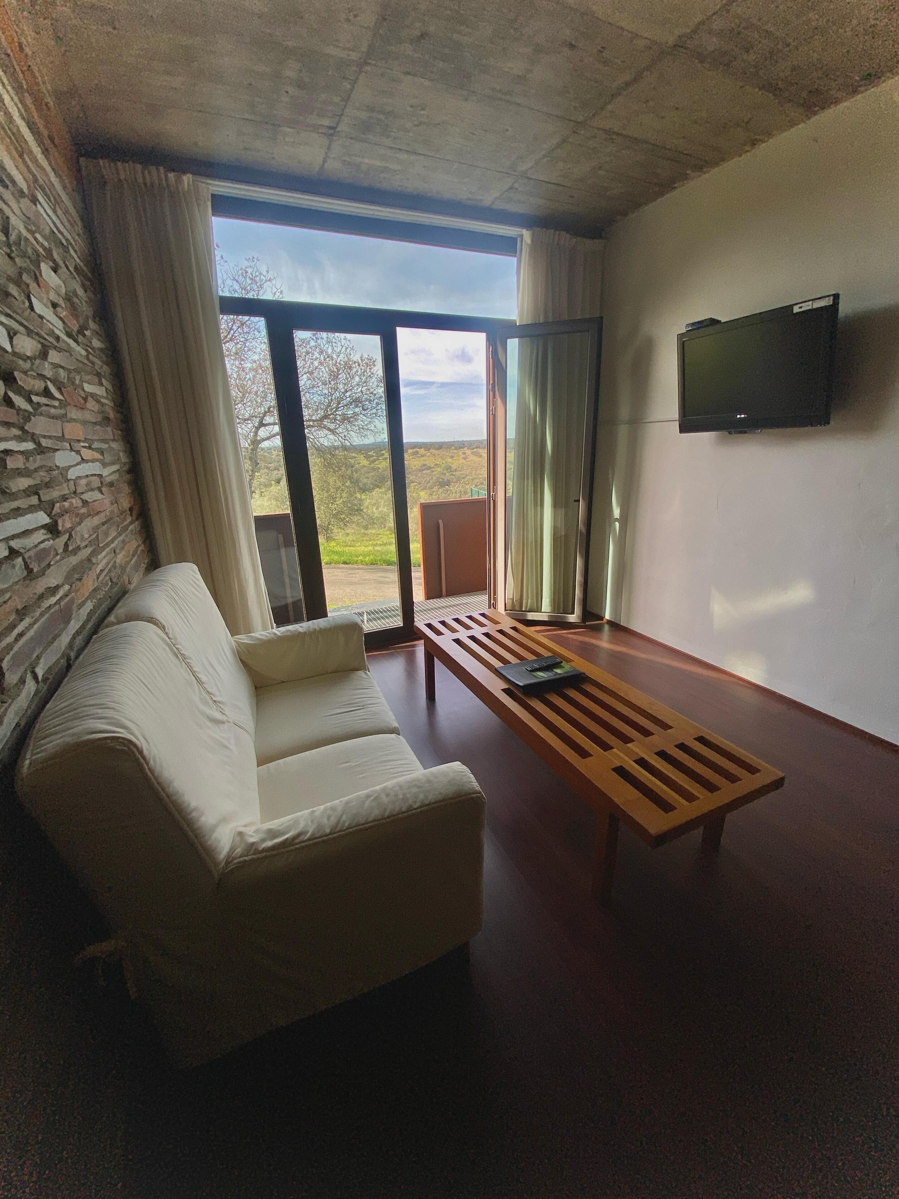 duplex | living area | flat-screen tv