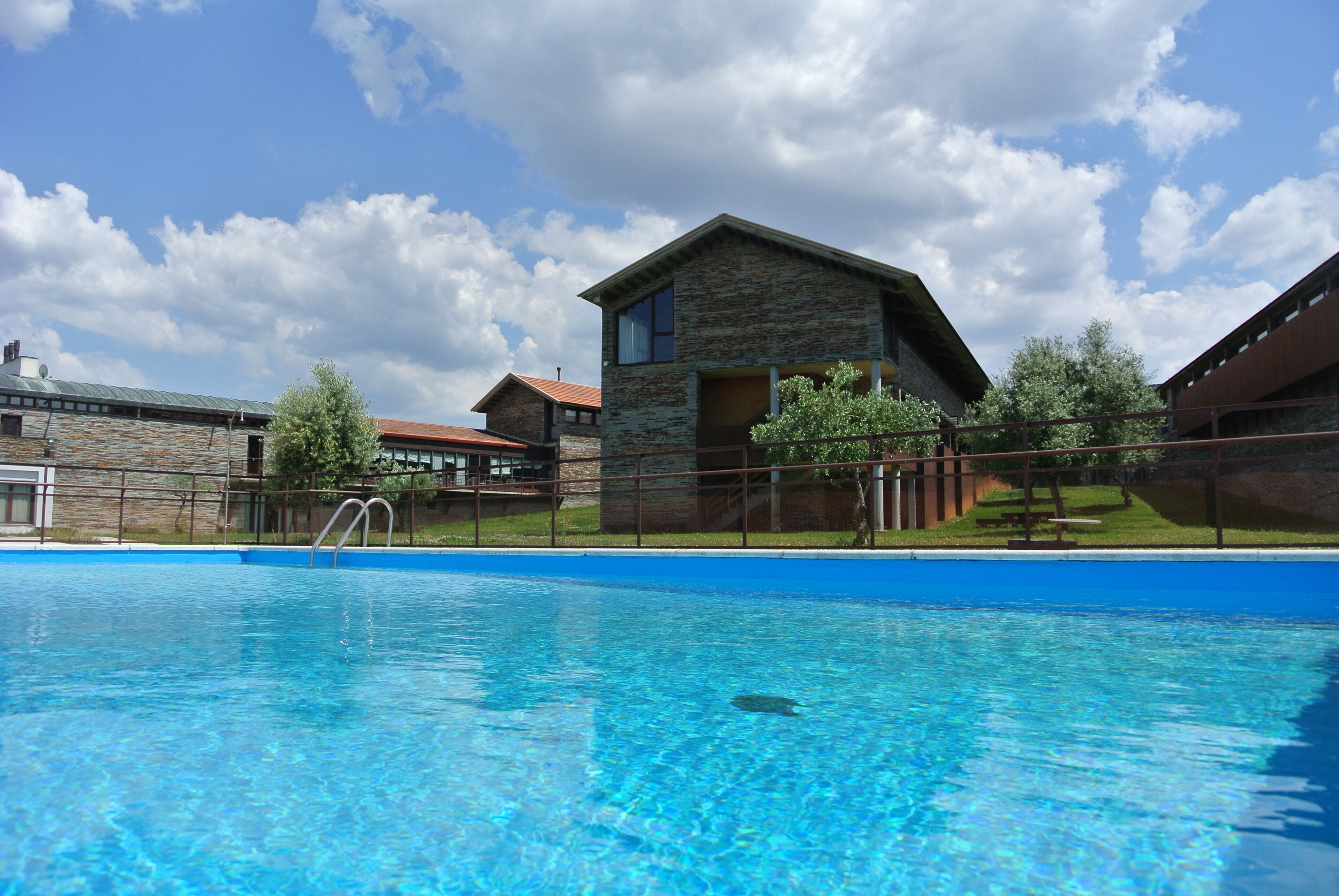 seasonal outdoor pool, pool loungers