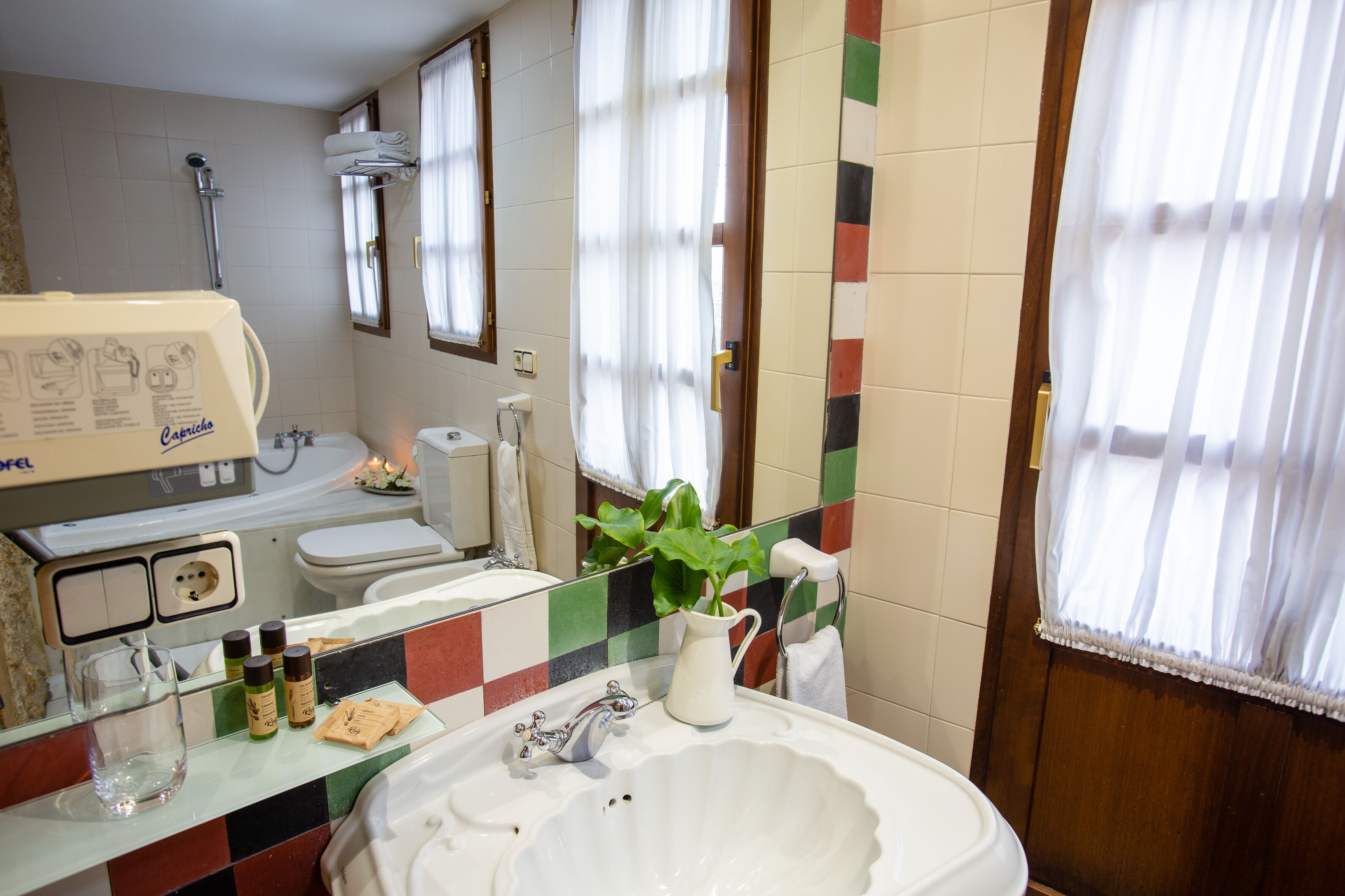 free toiletries, hair dryer, bidet, towels