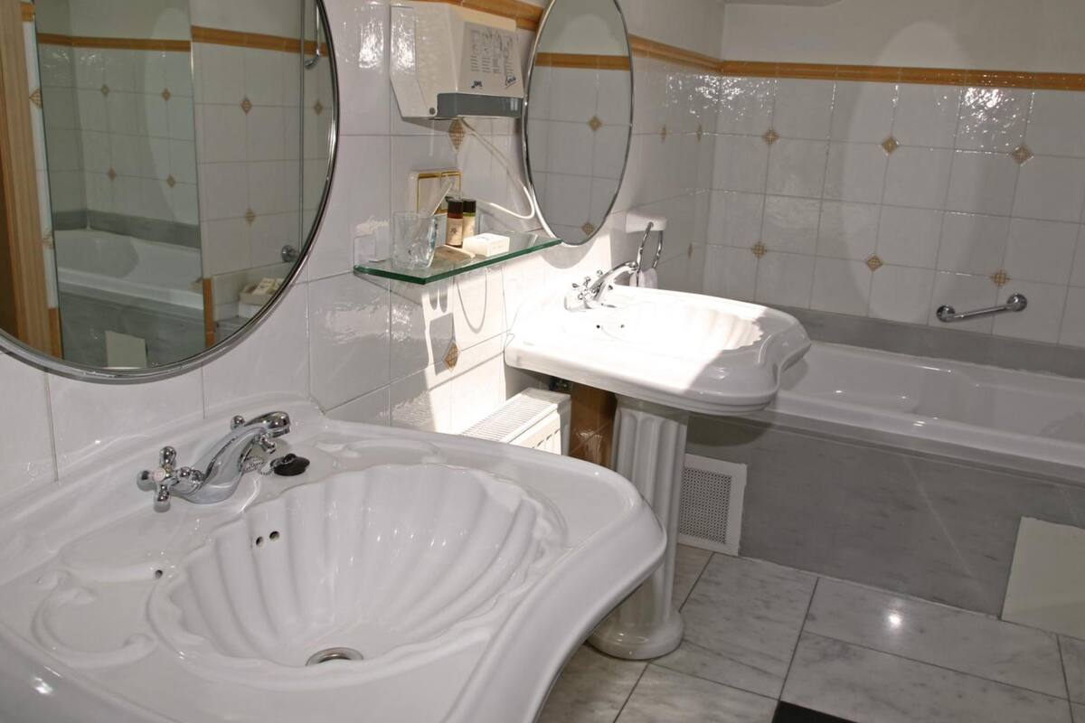 free toiletries, hair dryer, bidet, towels