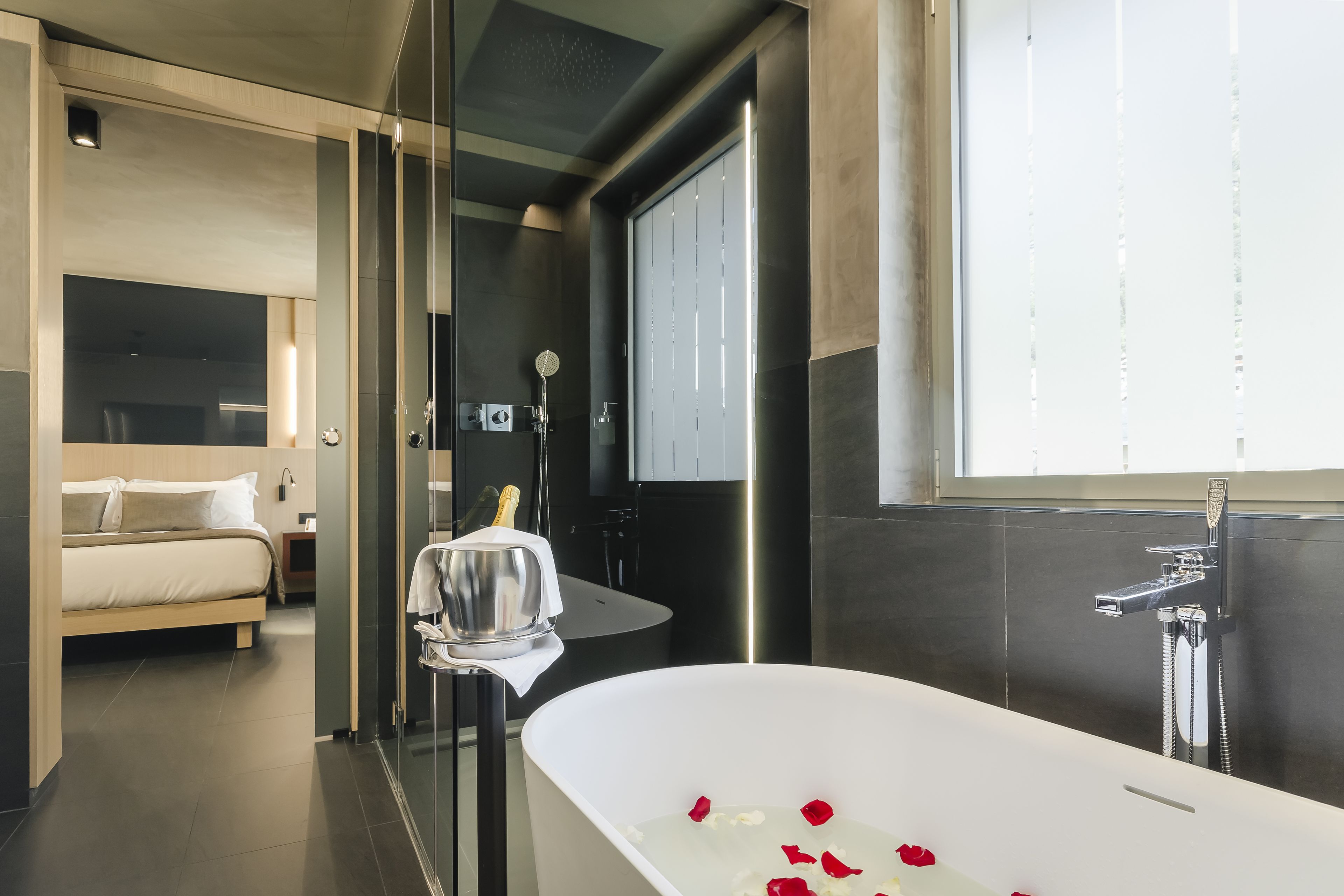 premium room, 1 king bed | bathroom | free toiletries, hair dryer, slippers, towels