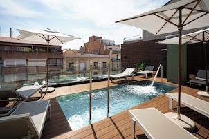 Seasonal outdoor pool, open 10:00 AM to 9:00 PM, sun loungers