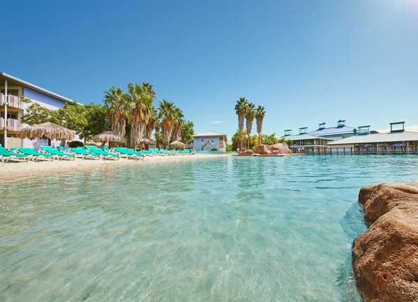 Indoor pool, seasonal outdoor pool, pool umbrellas, pool loungers