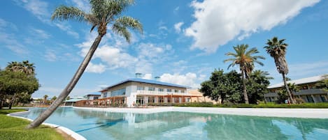 Indoor pool, seasonal outdoor pool, pool umbrellas, pool loungers