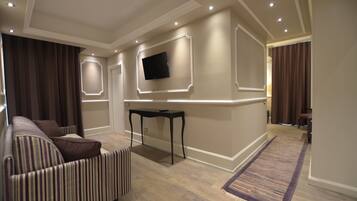 Suíte | Área de estar | TV