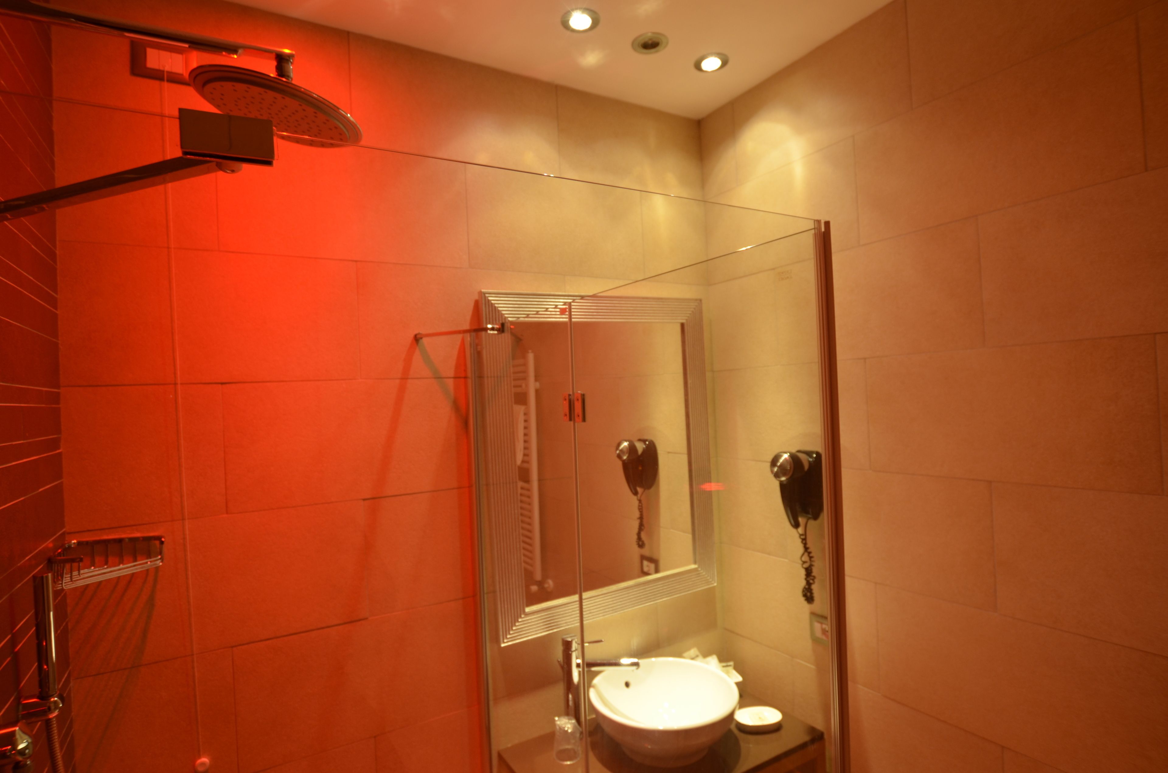 deep-soaking bathtub, rainfall showerhead, free toiletries, hair dryer