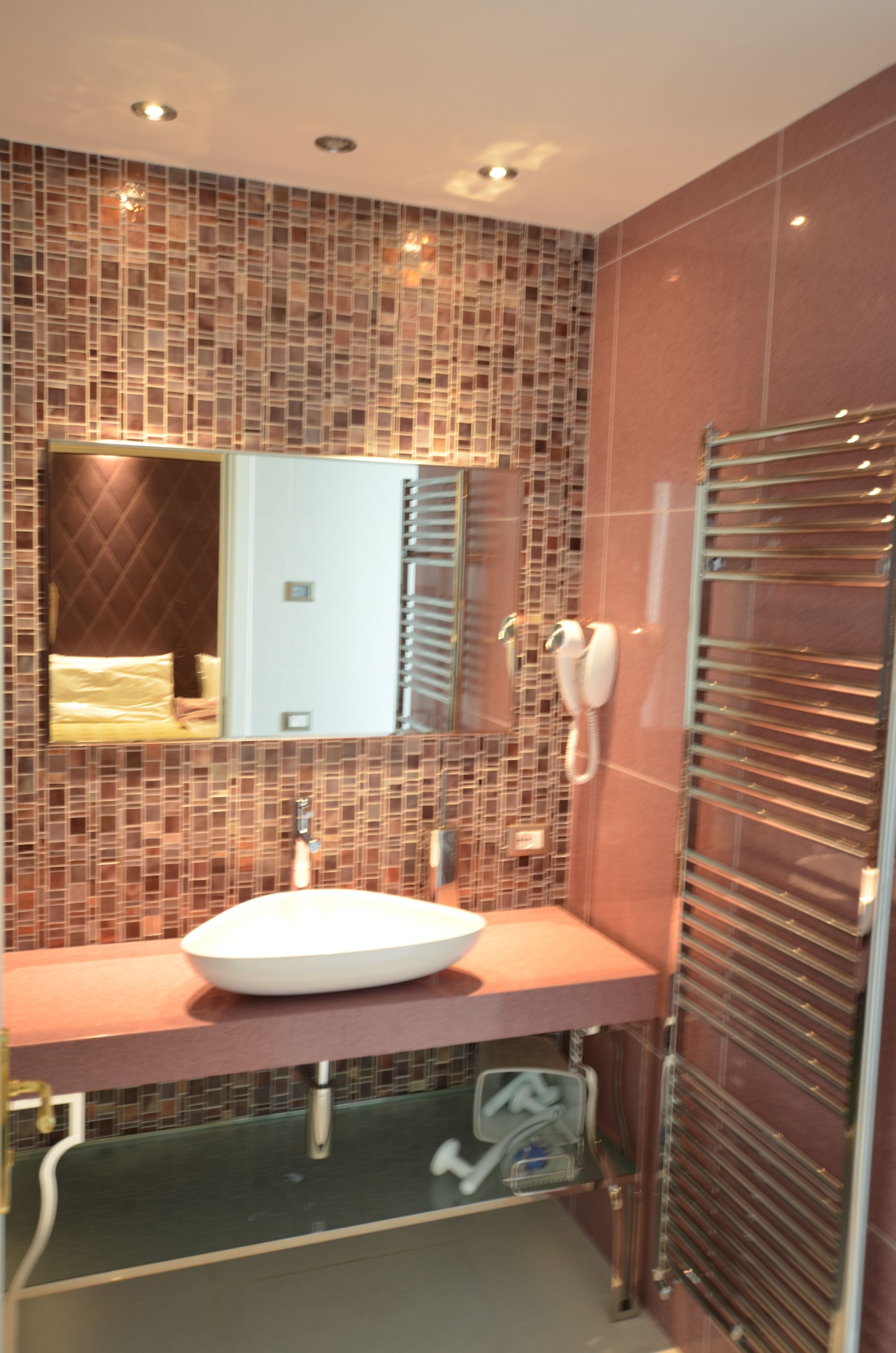 deep-soaking bathtub, rainfall showerhead, free toiletries, hair dryer