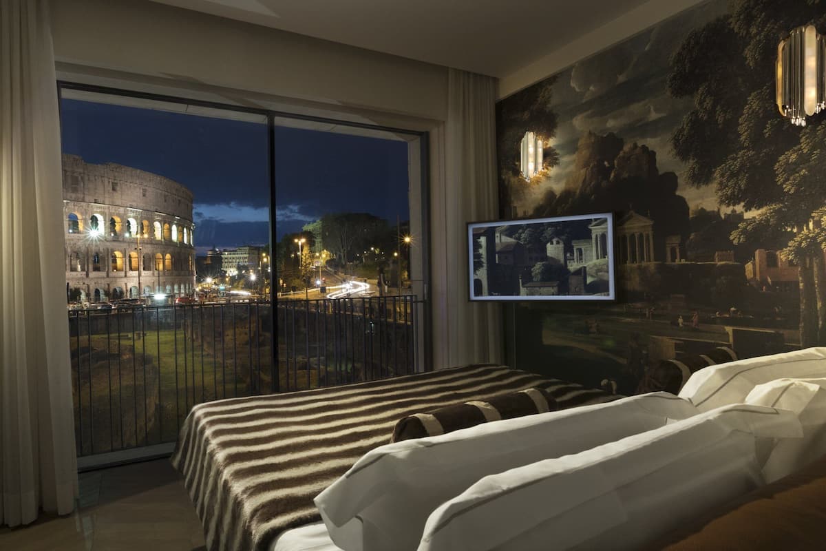 Suite junior, 1 cama King size (Colosseum View) | Ropa de cama de alta calidad, camas con efecto memoria y minibar
