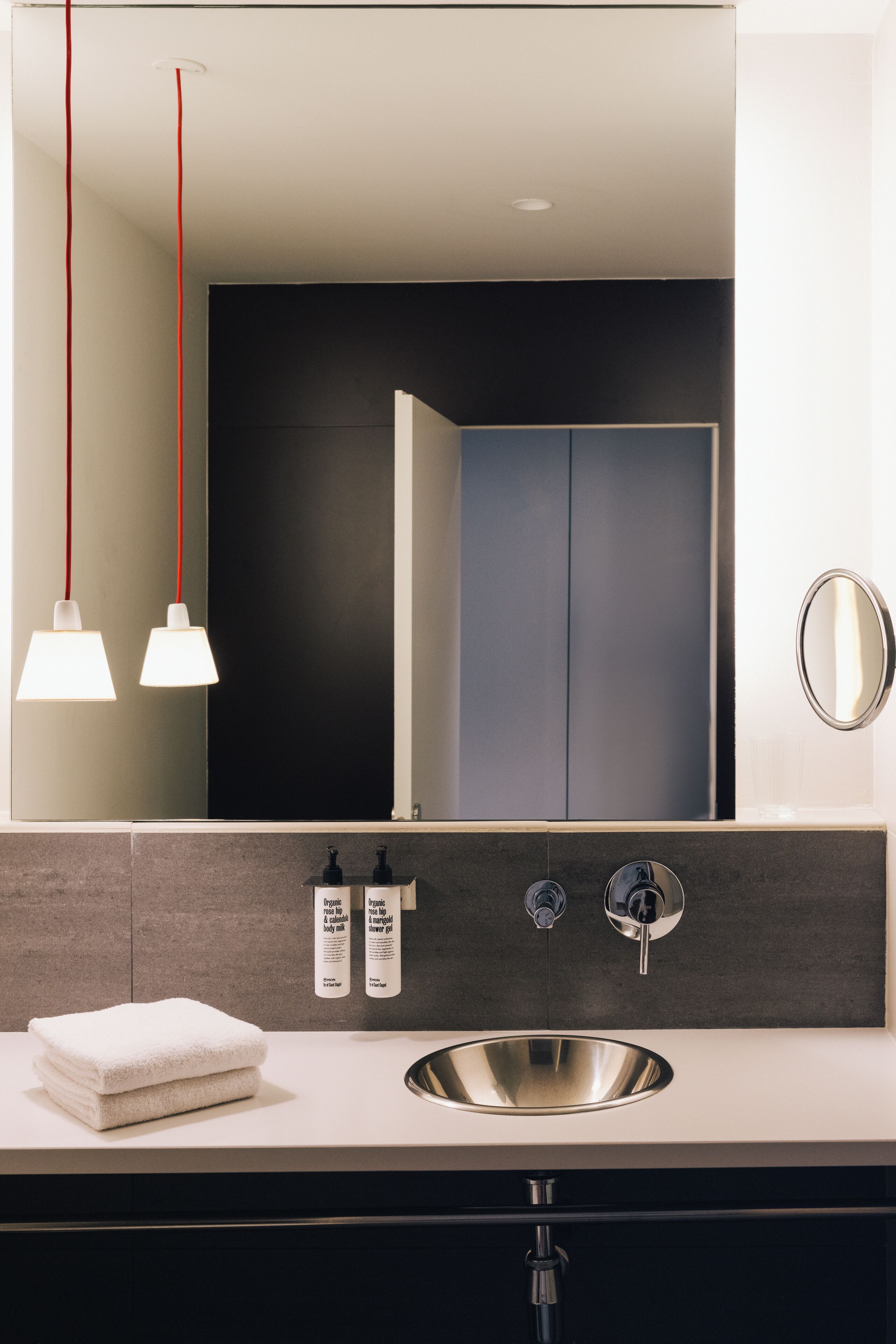 combined shower/bathtub, designer toiletries, hair dryer, bidet