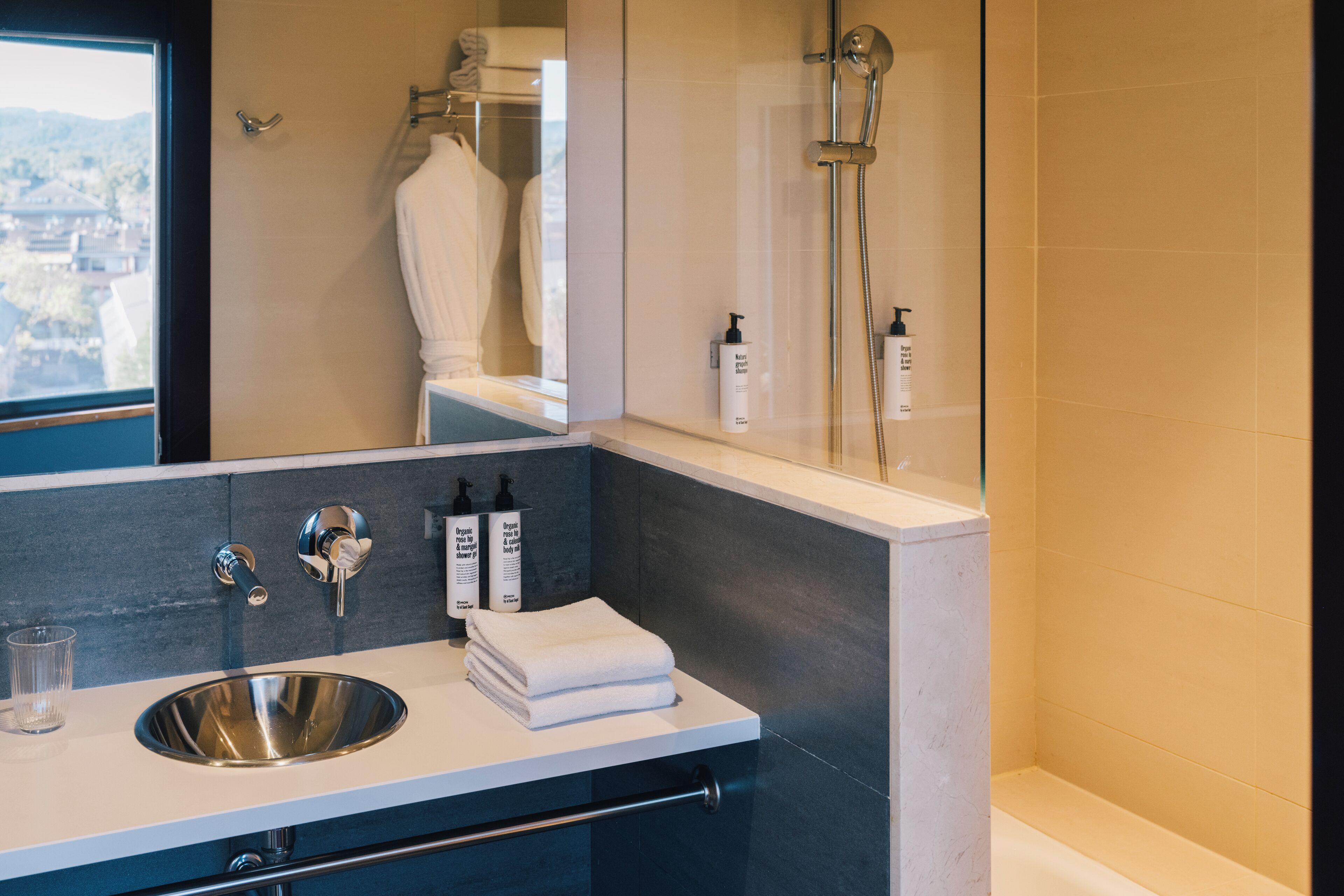 combined shower/bathtub, designer toiletries, hair dryer, bidet