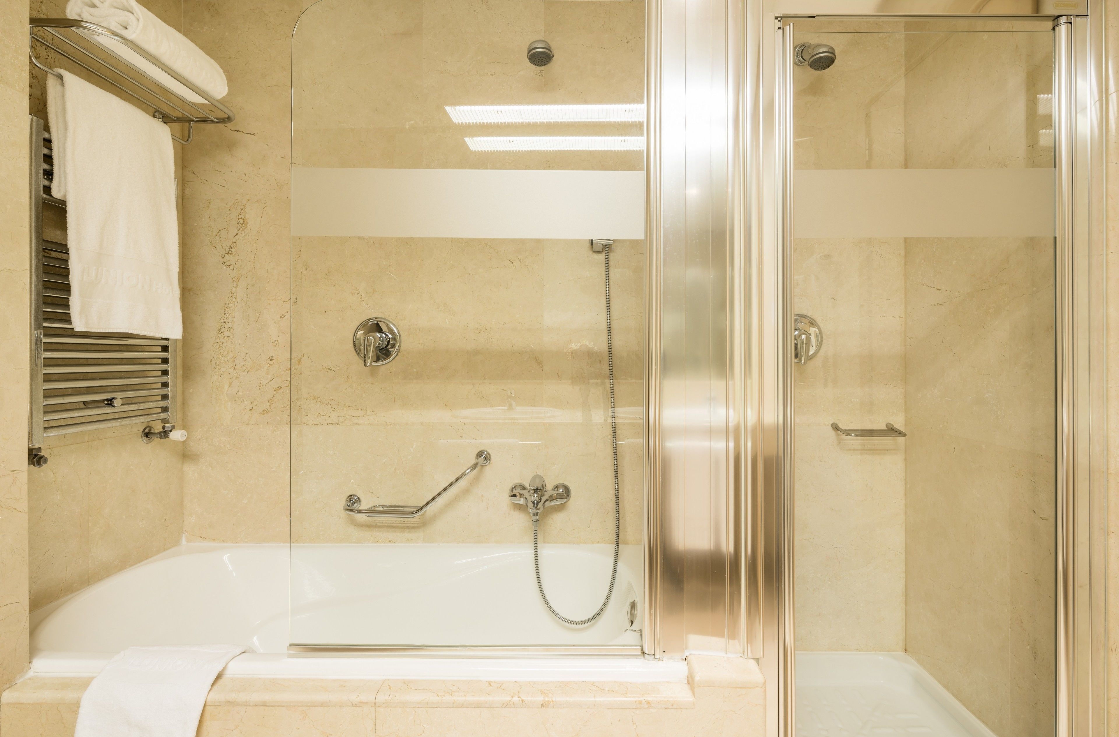 superior double room | bathroom | combined shower/bathtub, eco-friendly toiletries, hair dryer, bidet