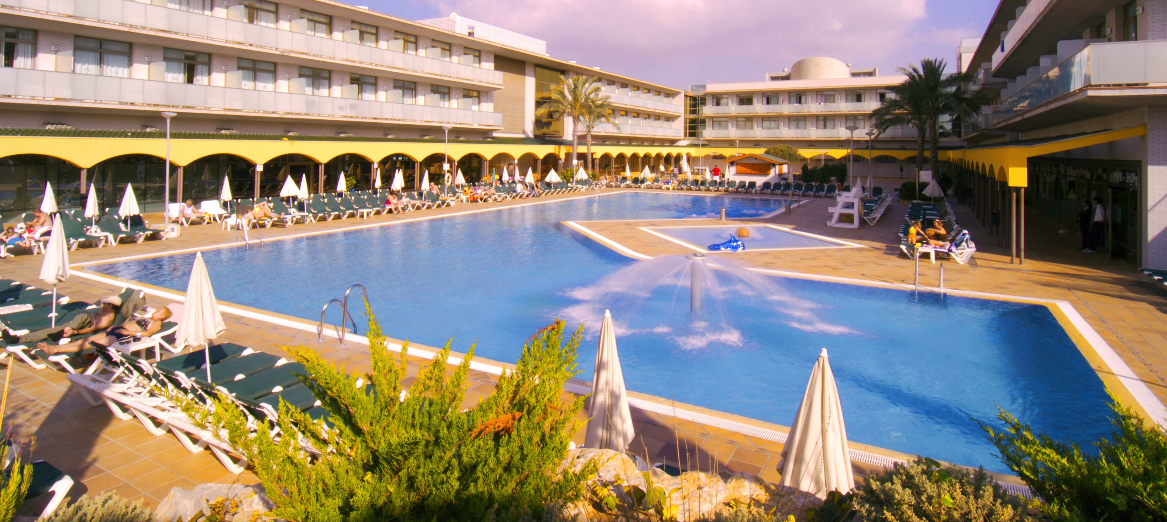 outdoor pool, pool umbrellas, pool loungers