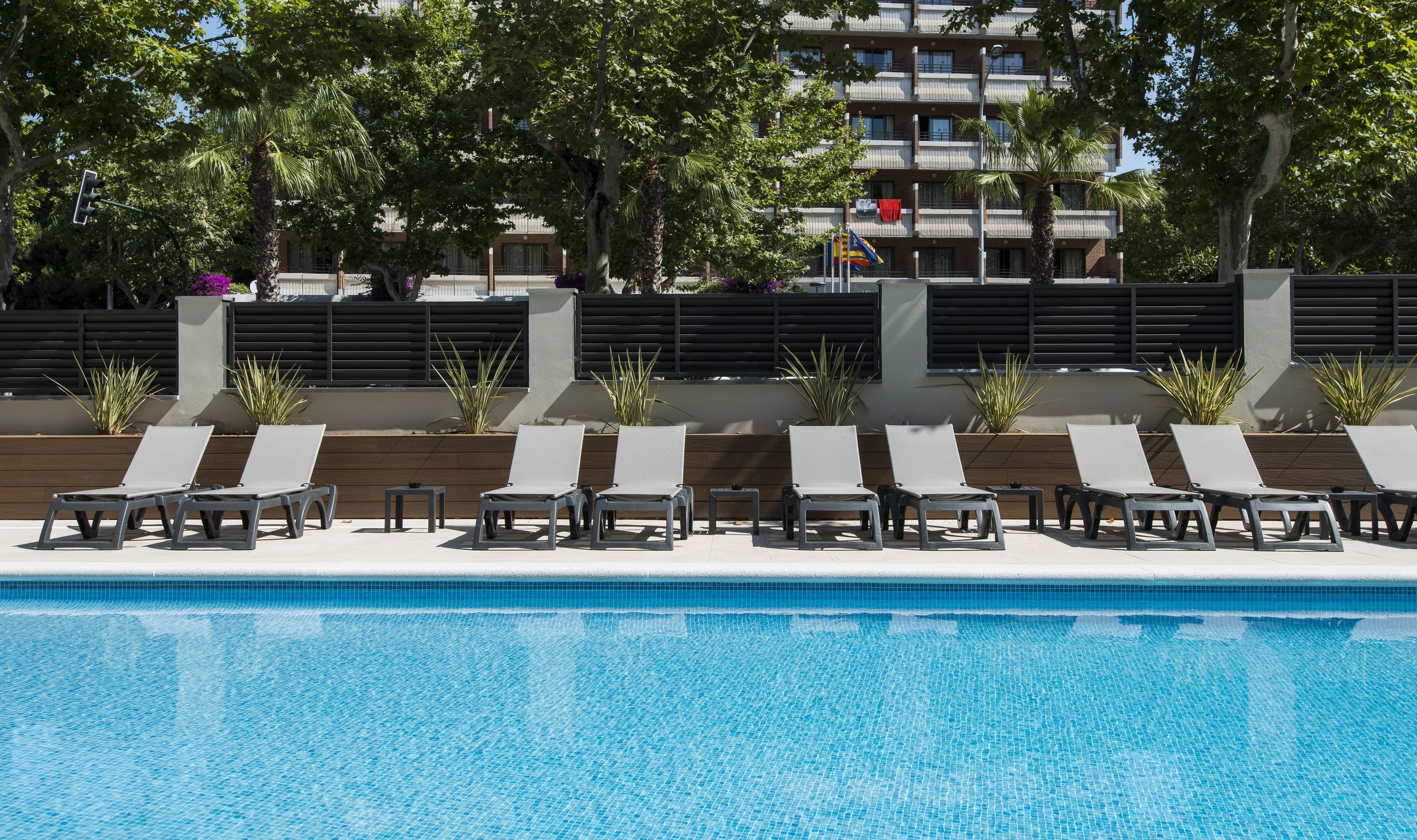 Seasonal outdoor pool, pool loungers