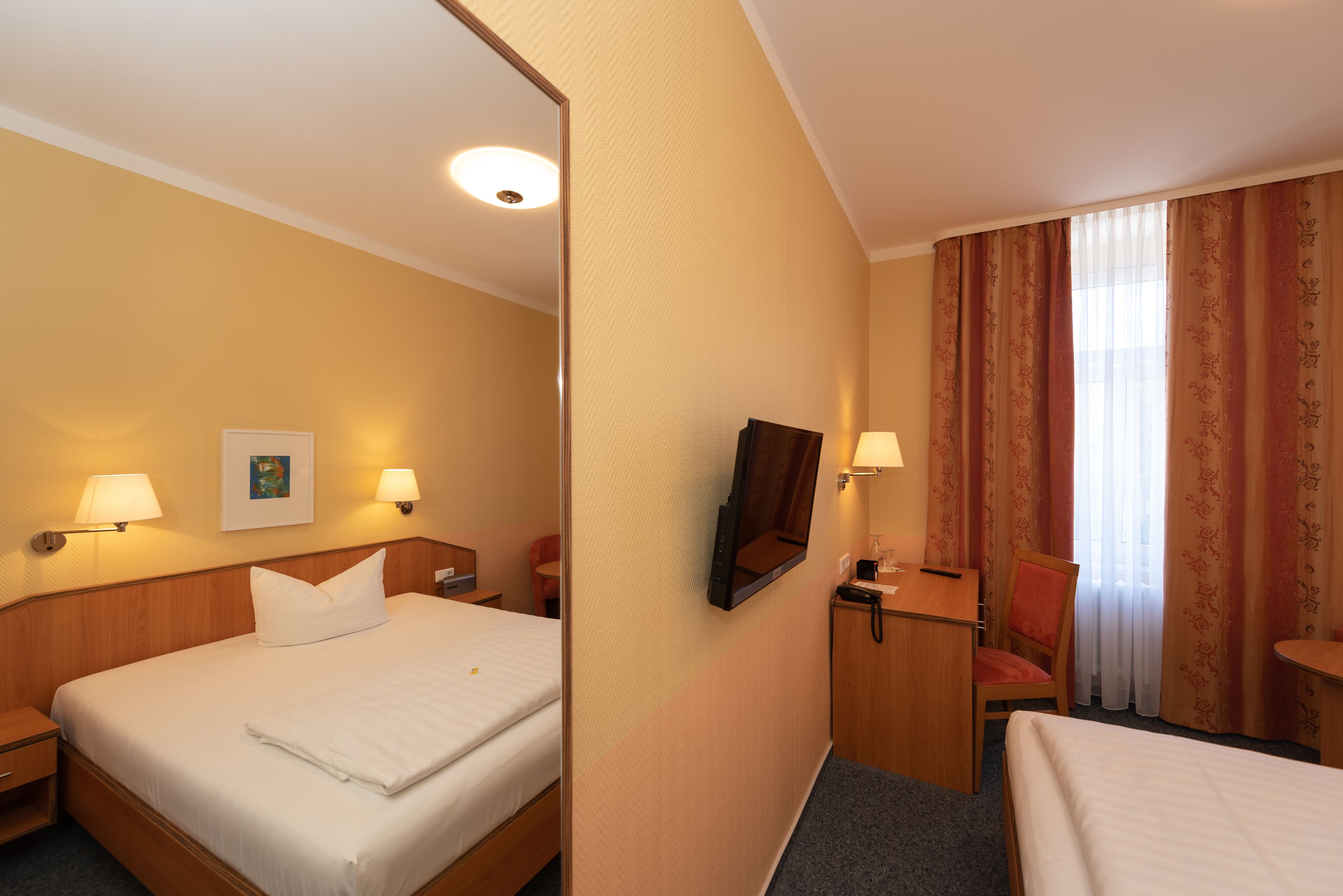 single room | living area | flat-screen tv