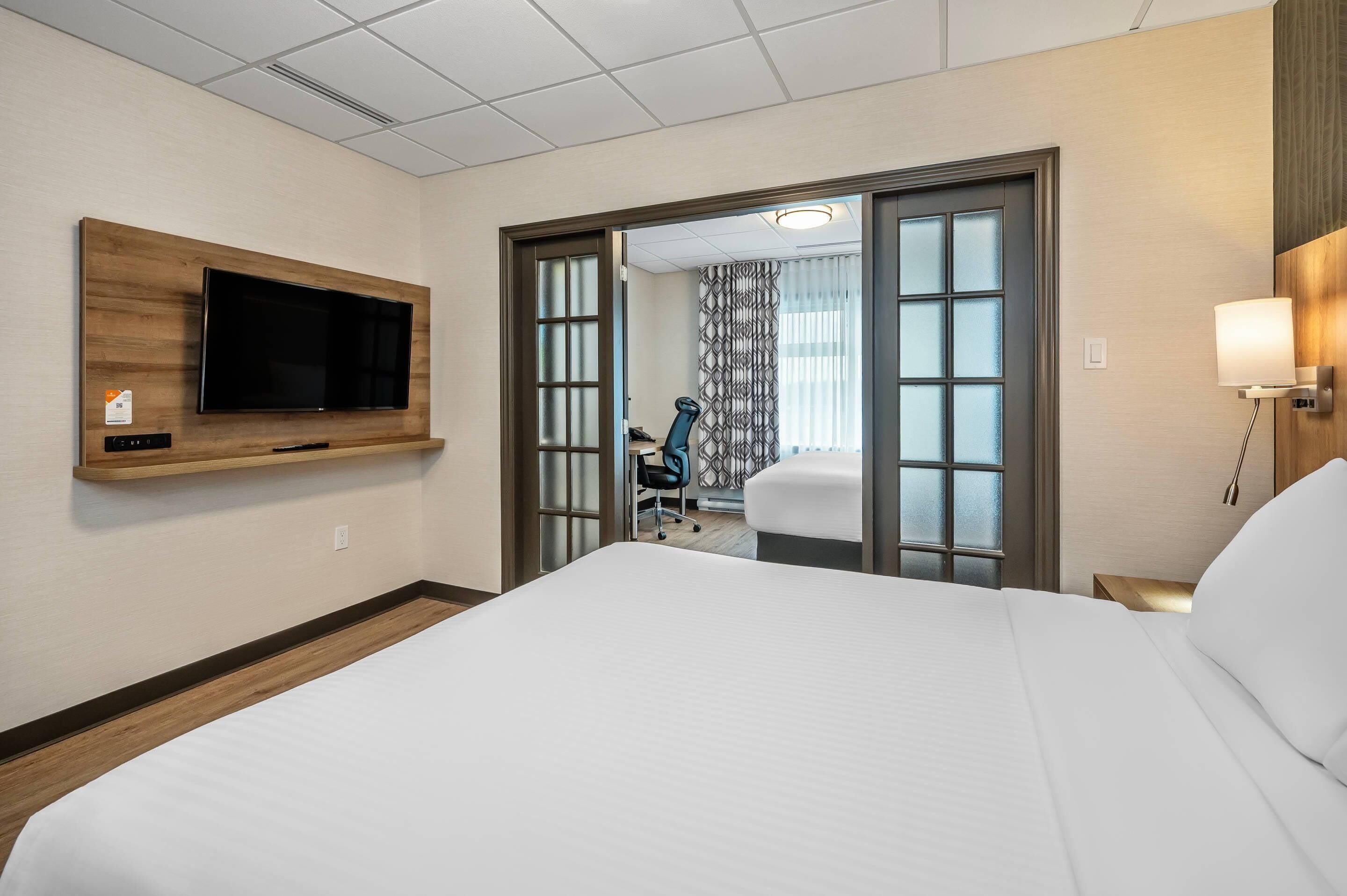 premium bedding, desk, laptop workspace, soundproofing