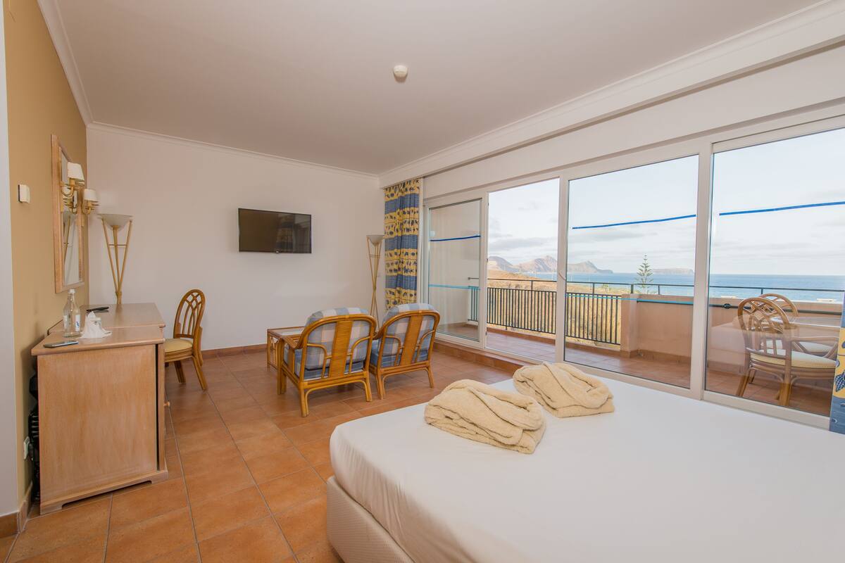 premium suite, sea view | 1 bedroom, in-room safe, desk, blackout curtains