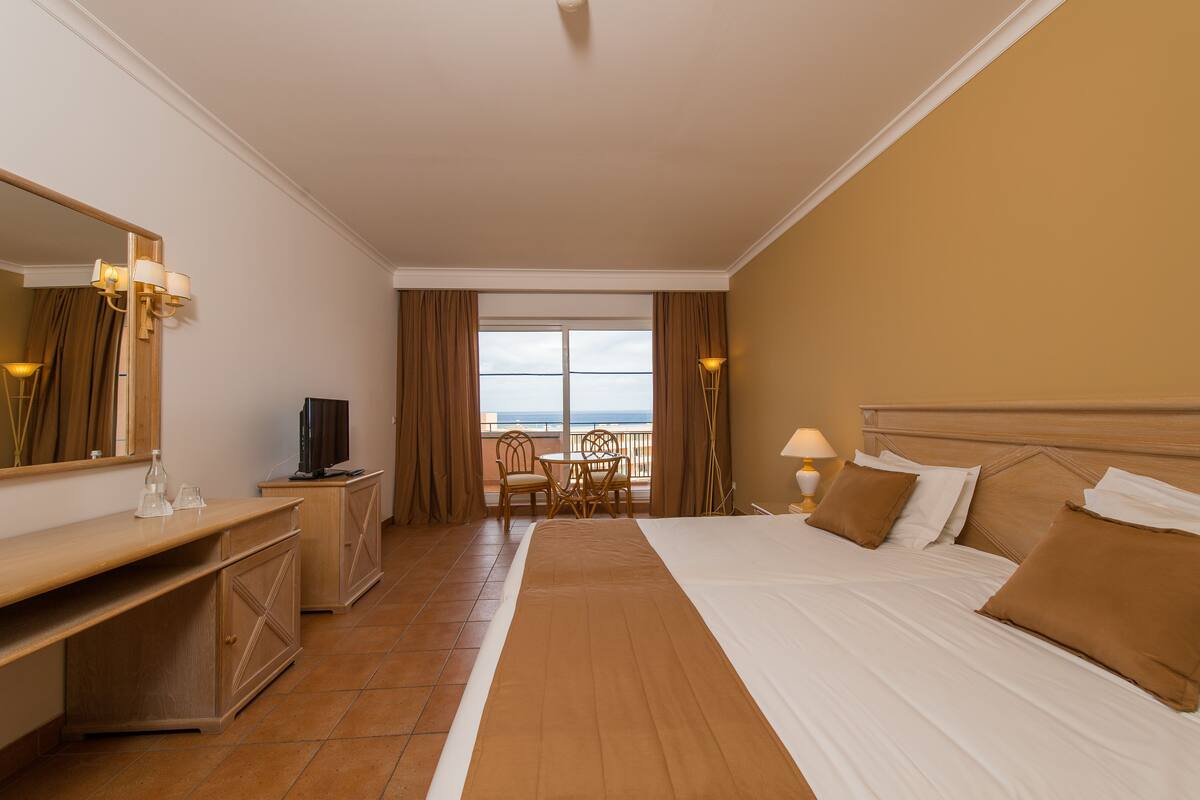 In-room safe, desk, blackout curtains, soundproofing