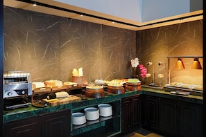 Daily buffet breakfast (USD 13 per person)