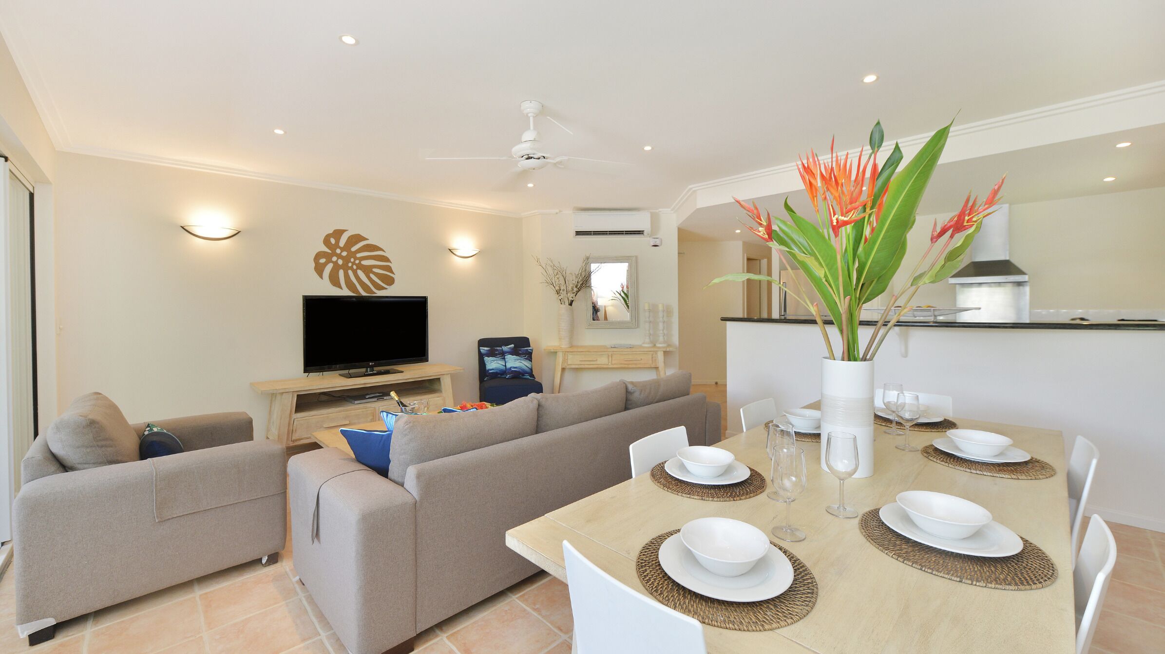 Deluxe Apartment, 1 Bedroom | Living area | 50-inch plasma TV with cable channels, TV, DVD player