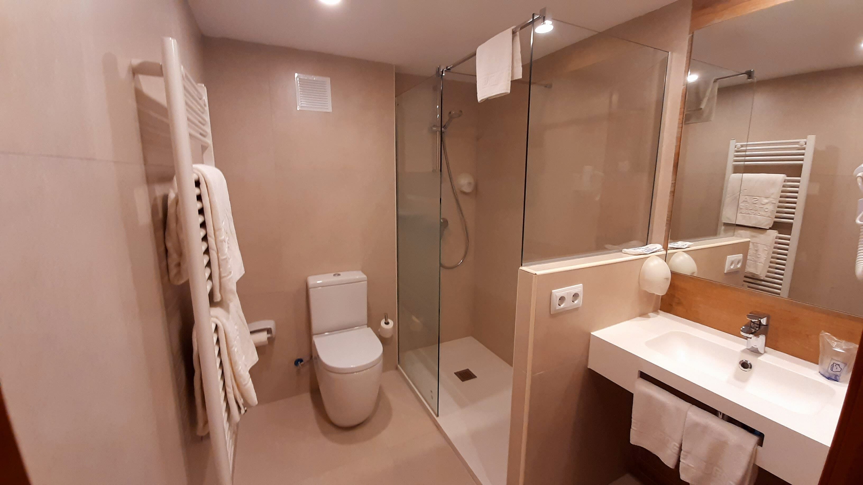 superior double room | bathroom | free toiletries, hair dryer, towels