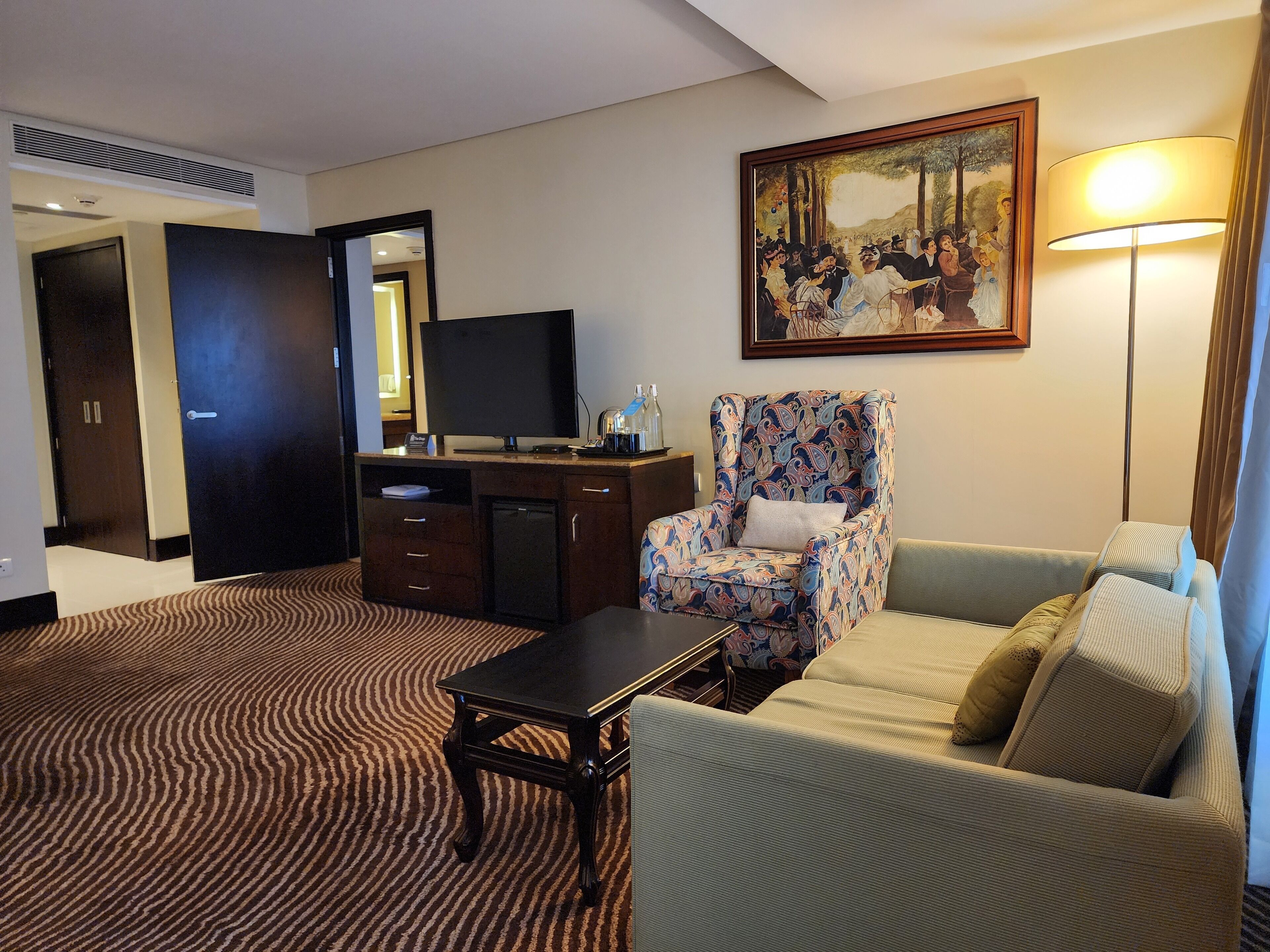 deluxe suite, 1 bedroom | living area | 32-inch led tv with premium tv channels, tv