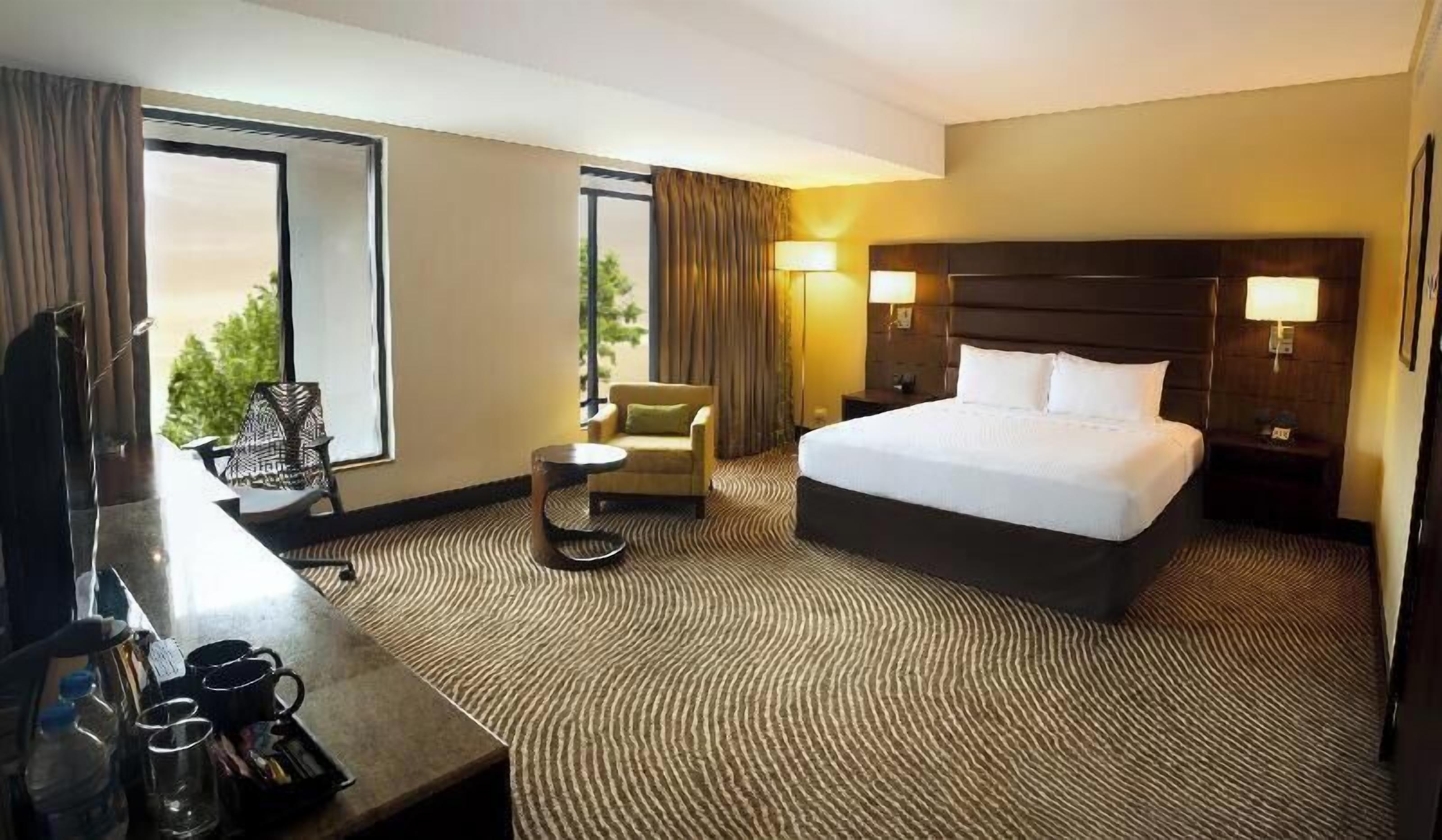 Premium bedding, memory-foam beds, in-room safe, desk