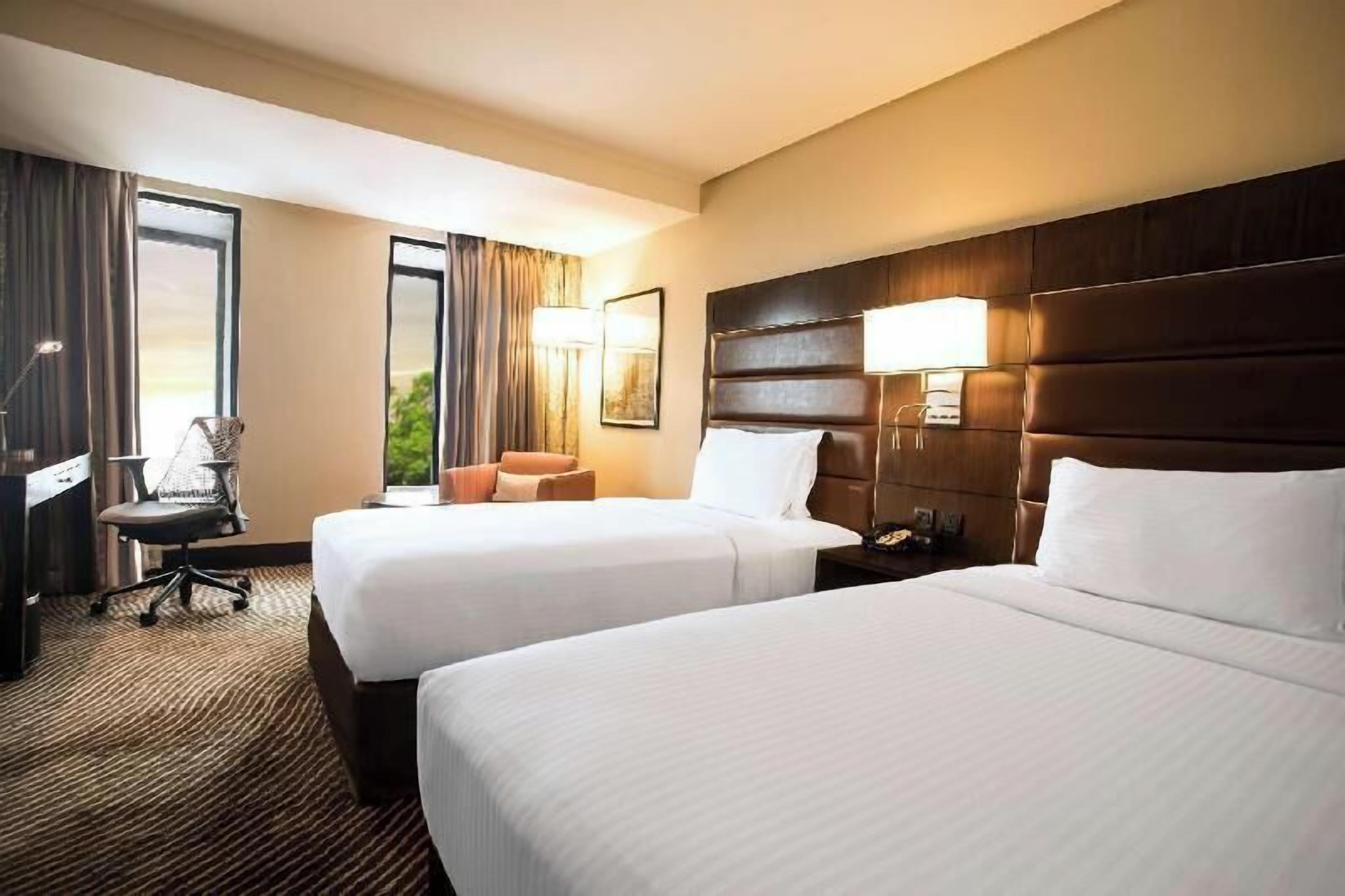 Premium bedding, memory-foam beds, in-room safe, desk