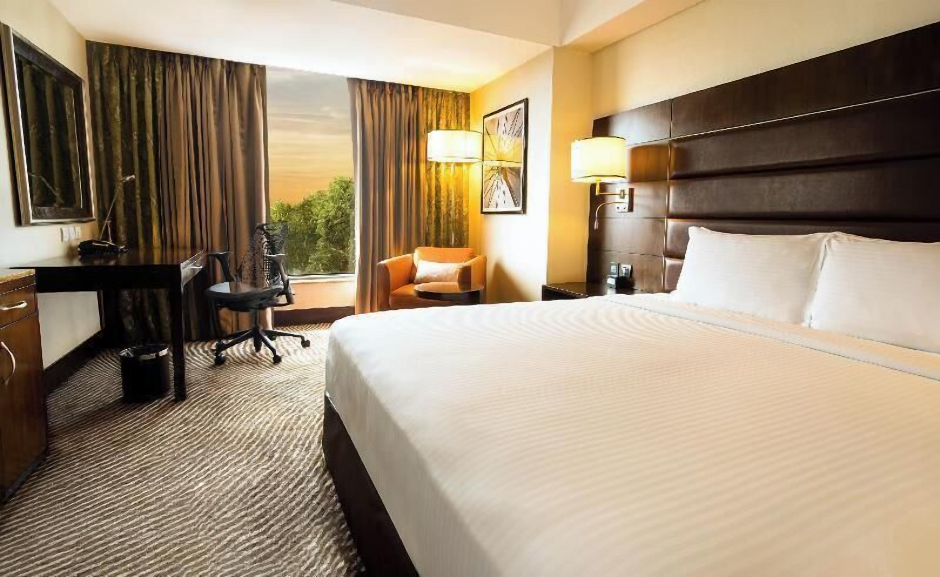 Premium bedding, memory-foam beds, in-room safe, desk