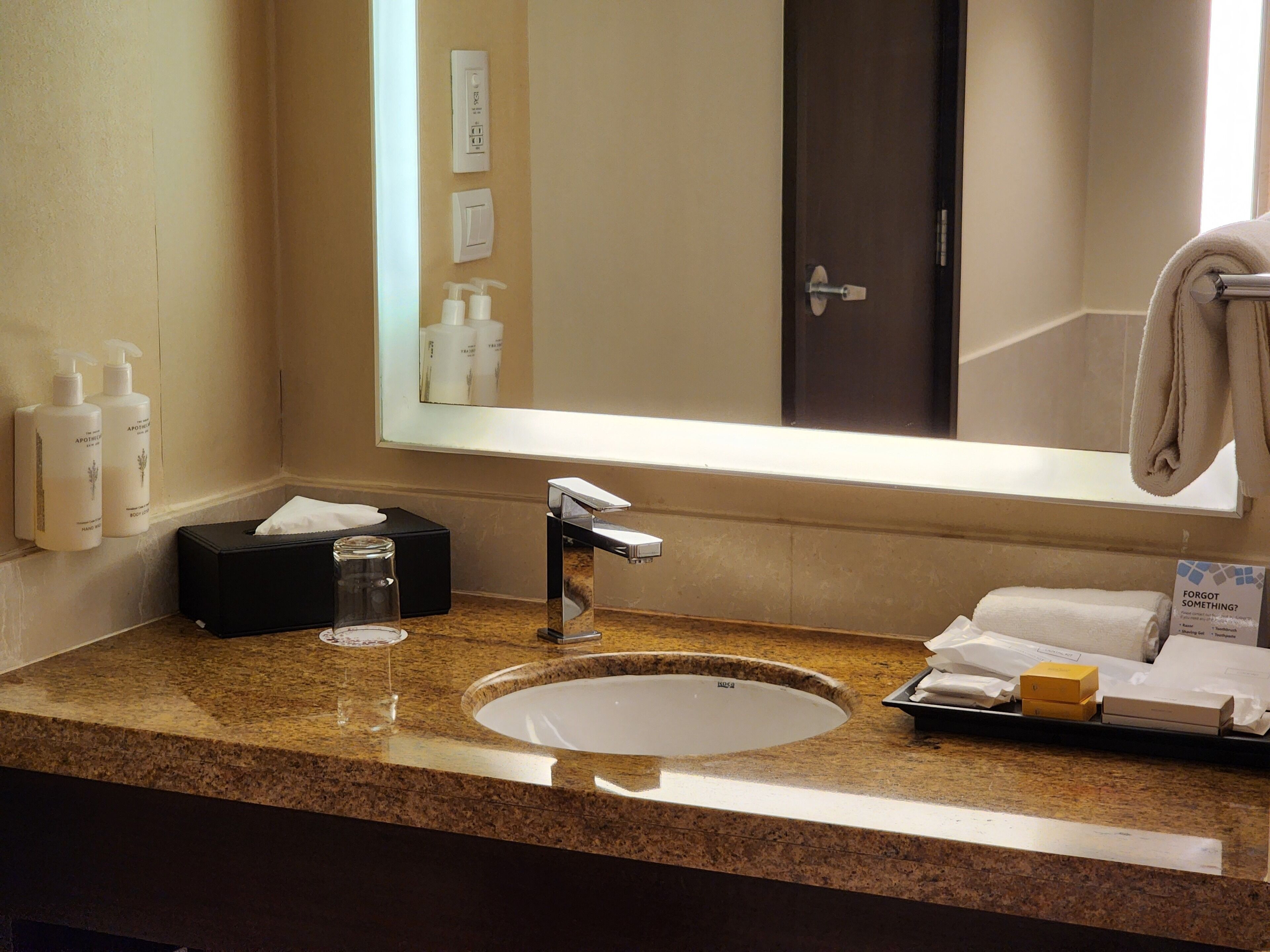 designer toiletries, bathrobes, slippers, bidet