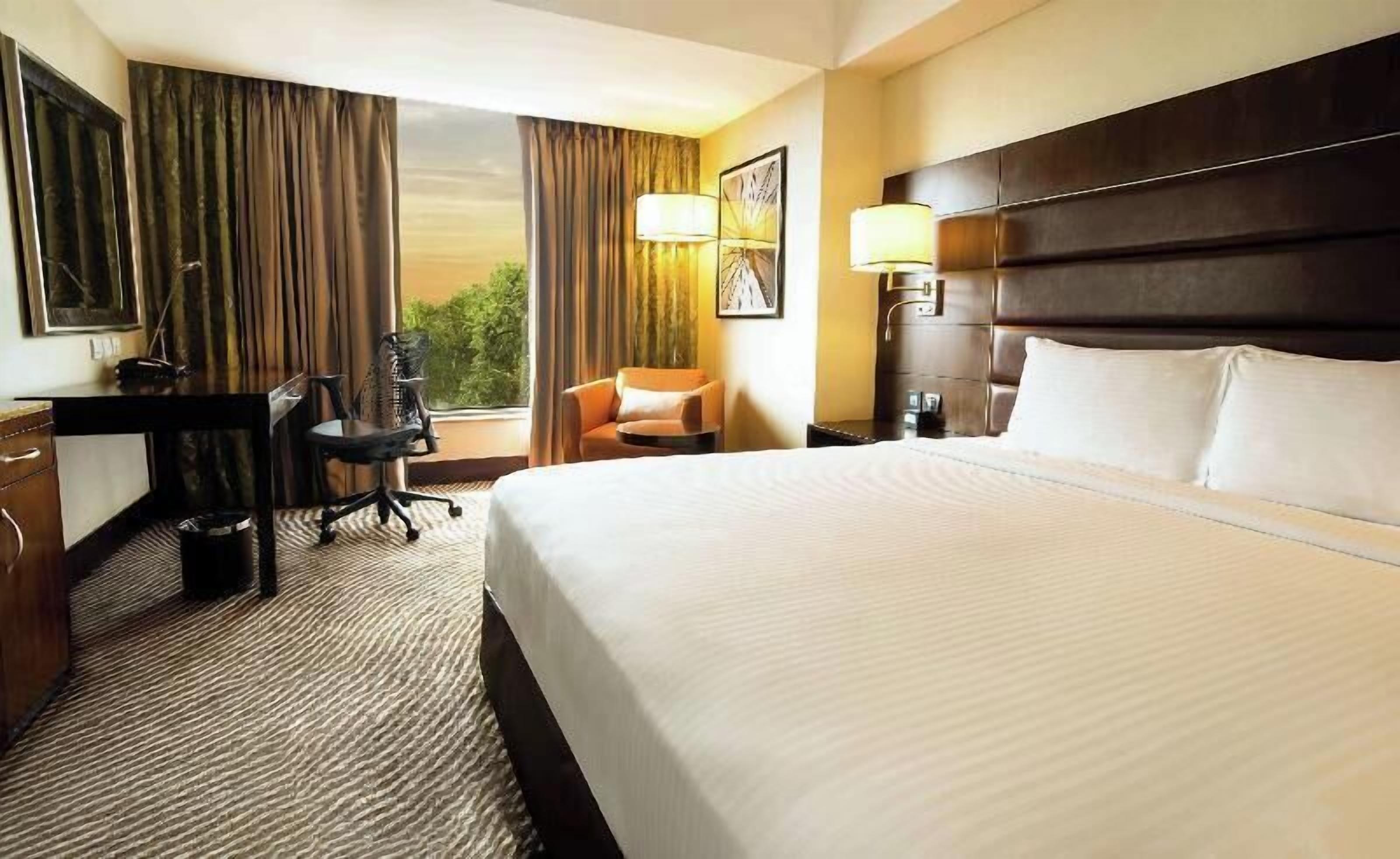 Premium bedding, memory-foam beds, in-room safe, desk