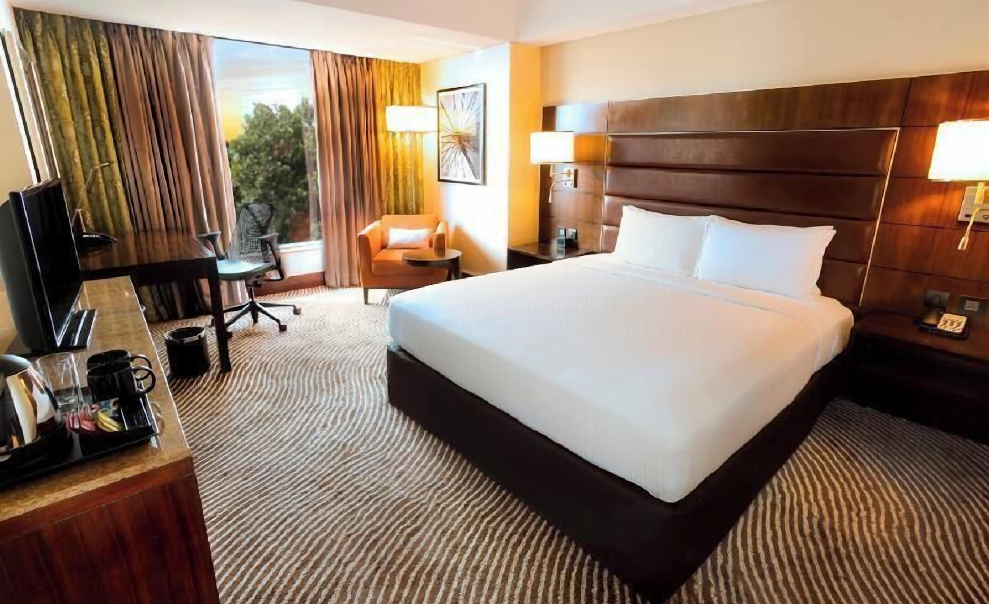 Premium bedding, memory-foam beds, in-room safe, desk