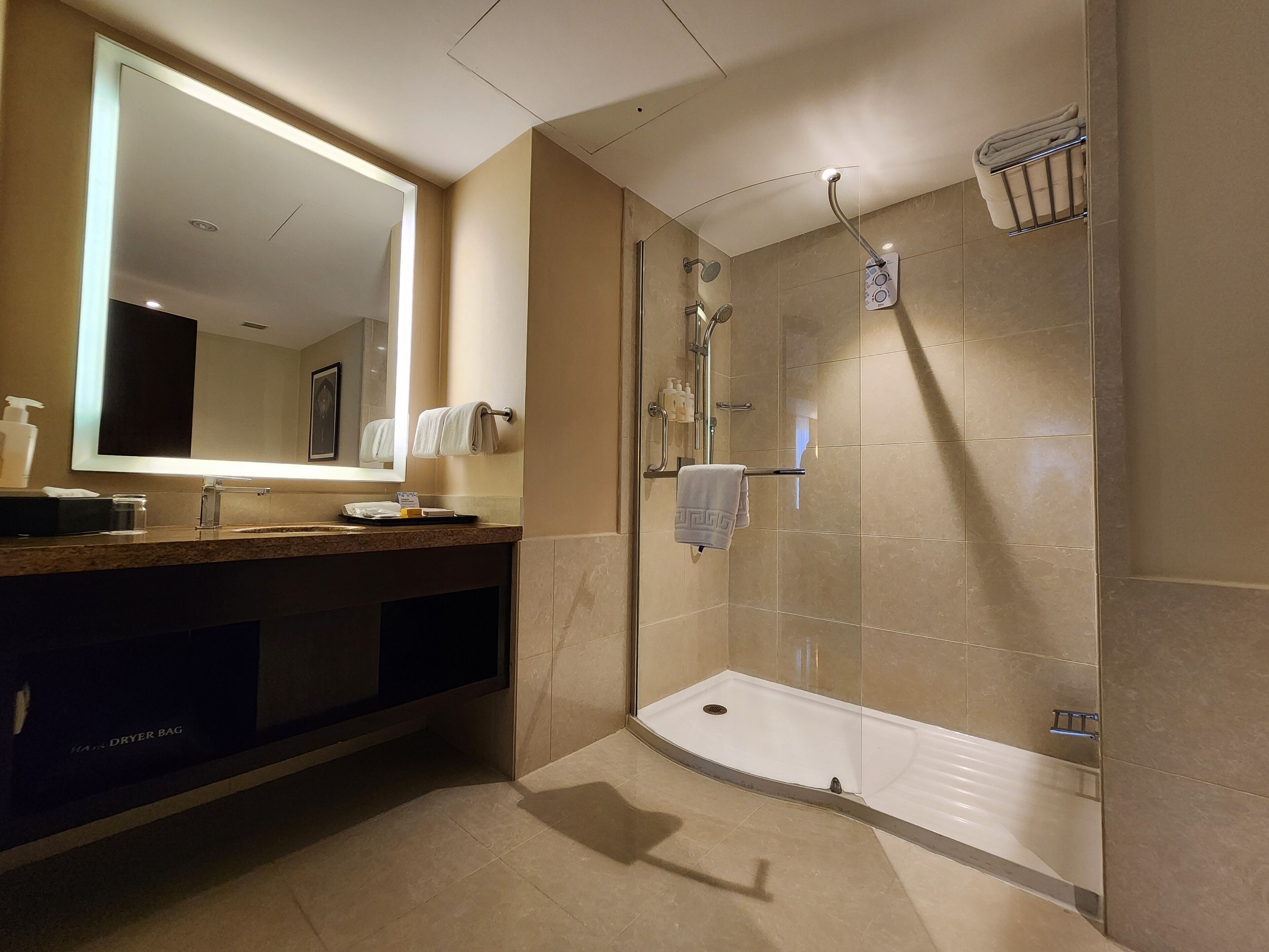 designer toiletries, bathrobes, slippers, bidet