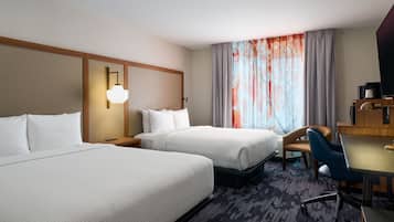 Select Comfort beds, desk, laptop workspace, blackout curtains