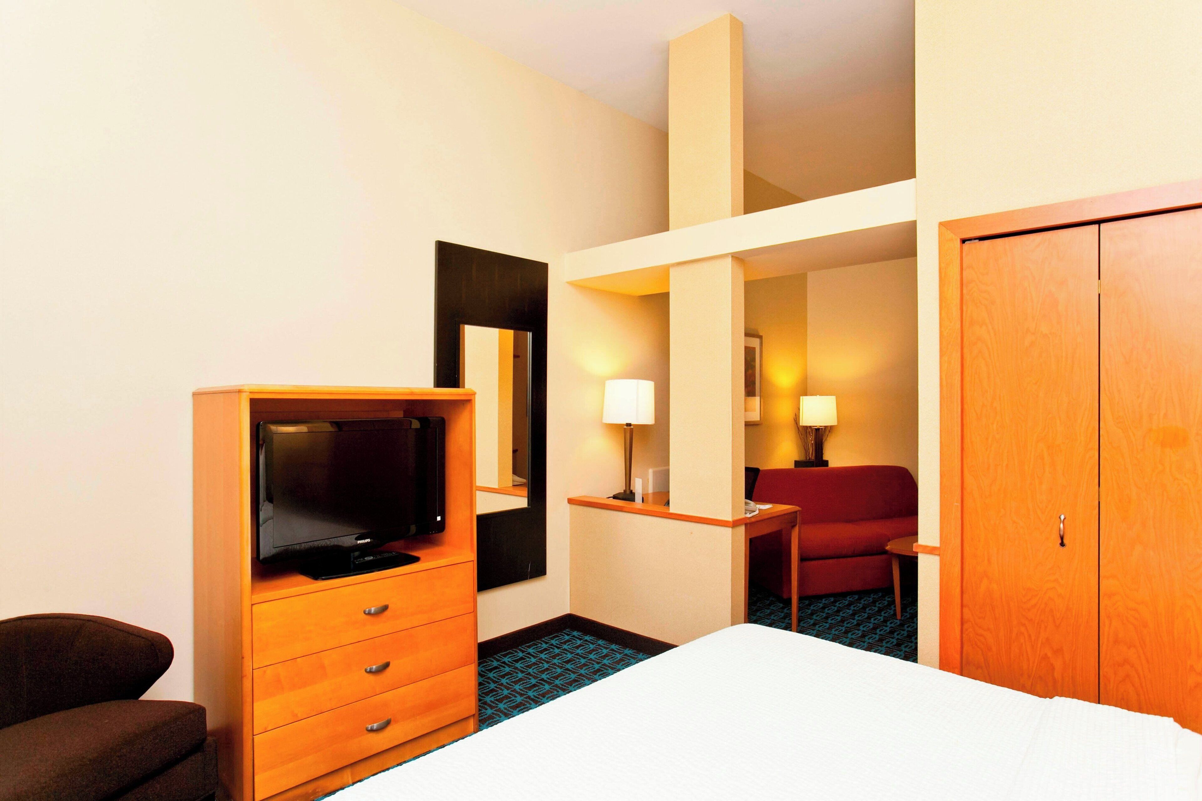 select comfort beds, desk, laptop workspace, blackout curtains