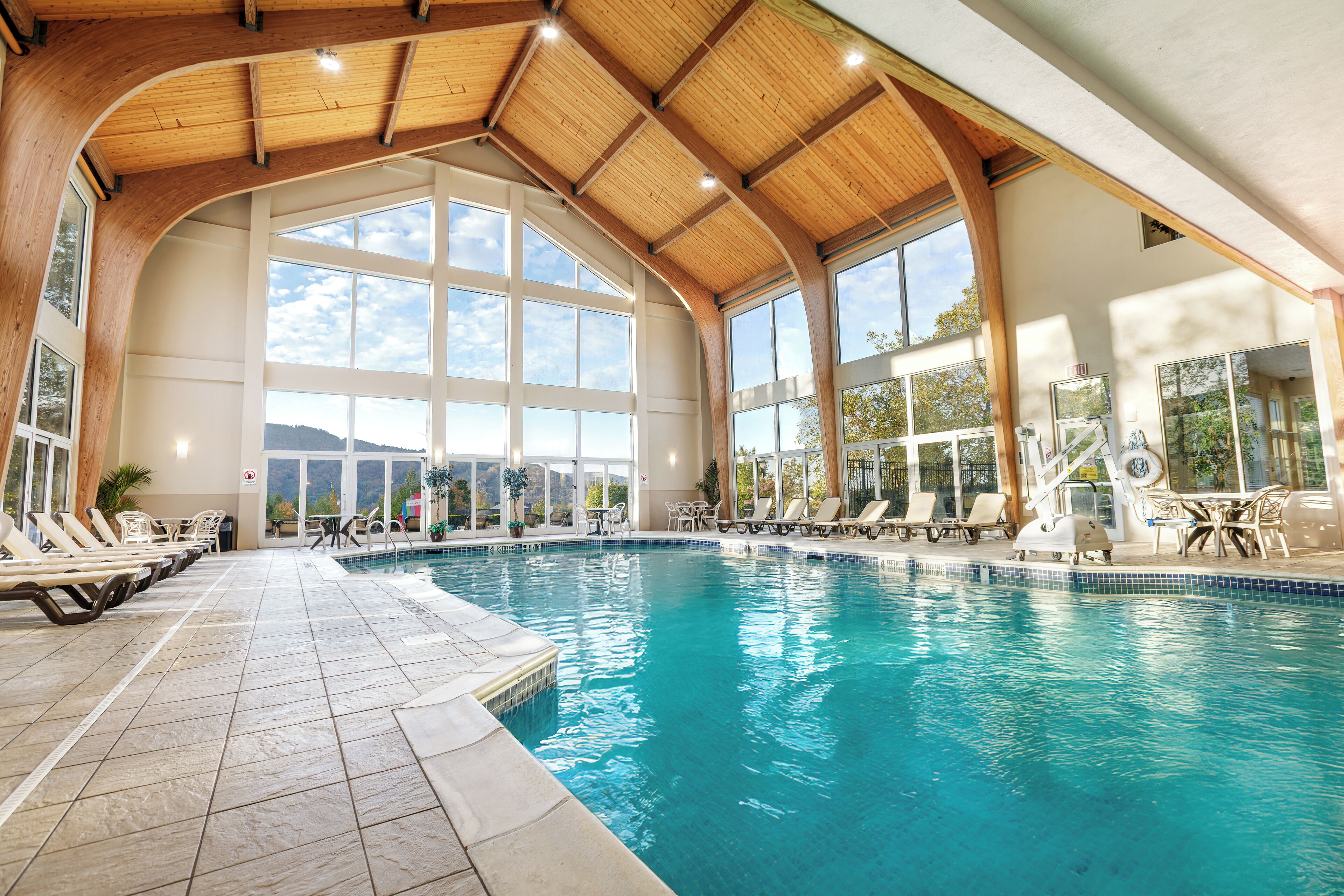Indoor pool, outdoor pool, pool umbrellas