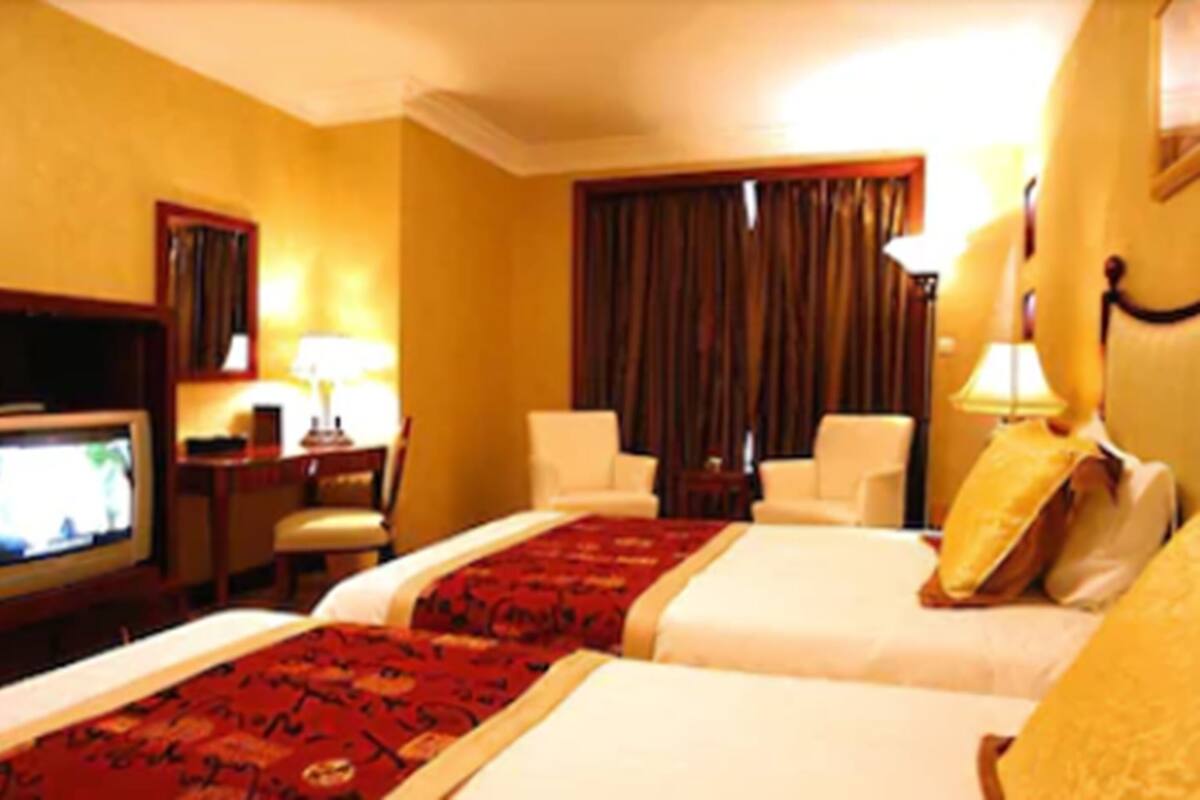 Twin Room, City View | Minibar, in-room safe, desk, blackout drapes