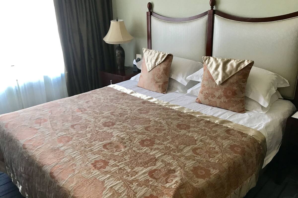 Room, River View | Minibar, in-room safe, desk, blackout drapes
