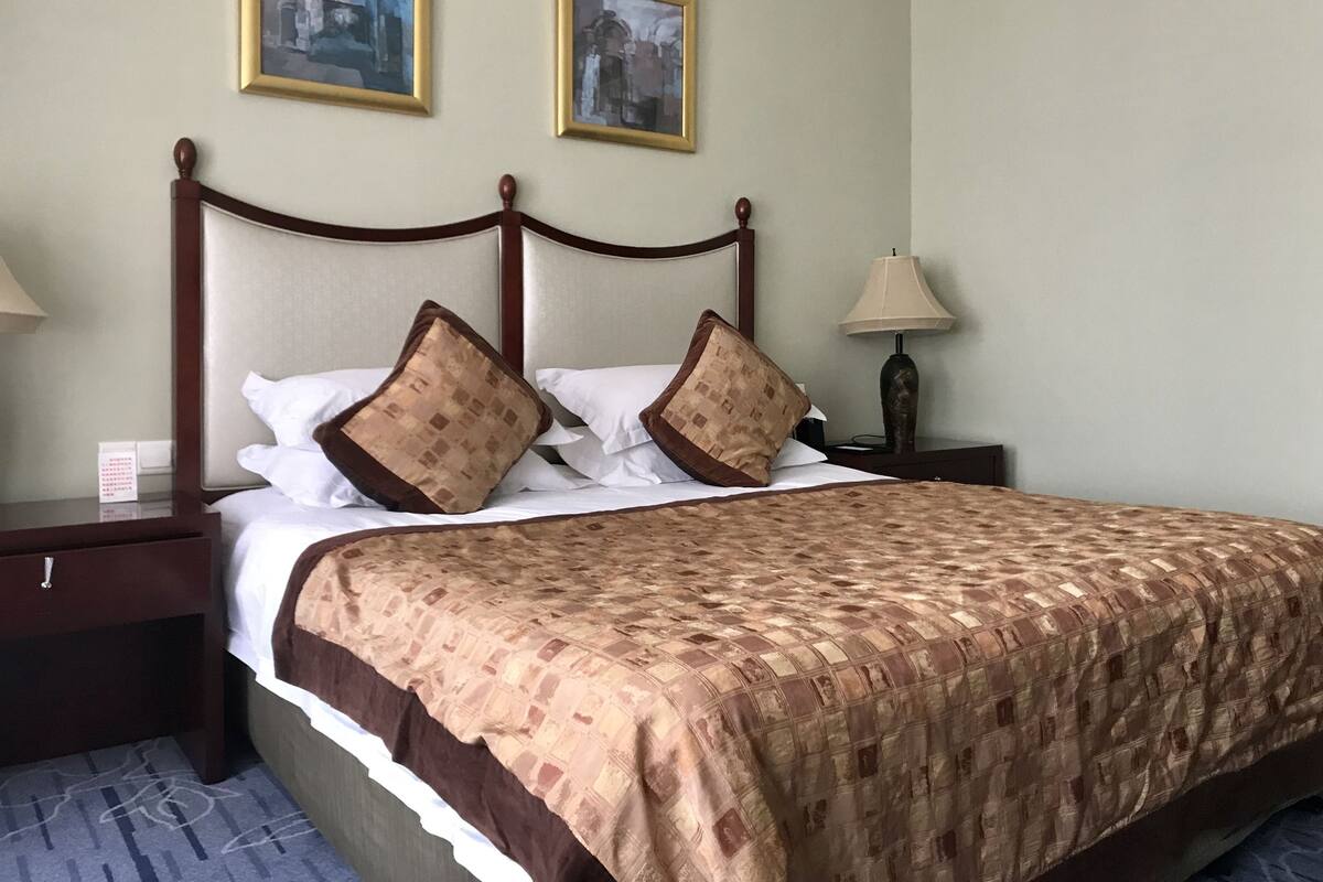 Room, City View | Minibar, in-room safe, desk, blackout drapes