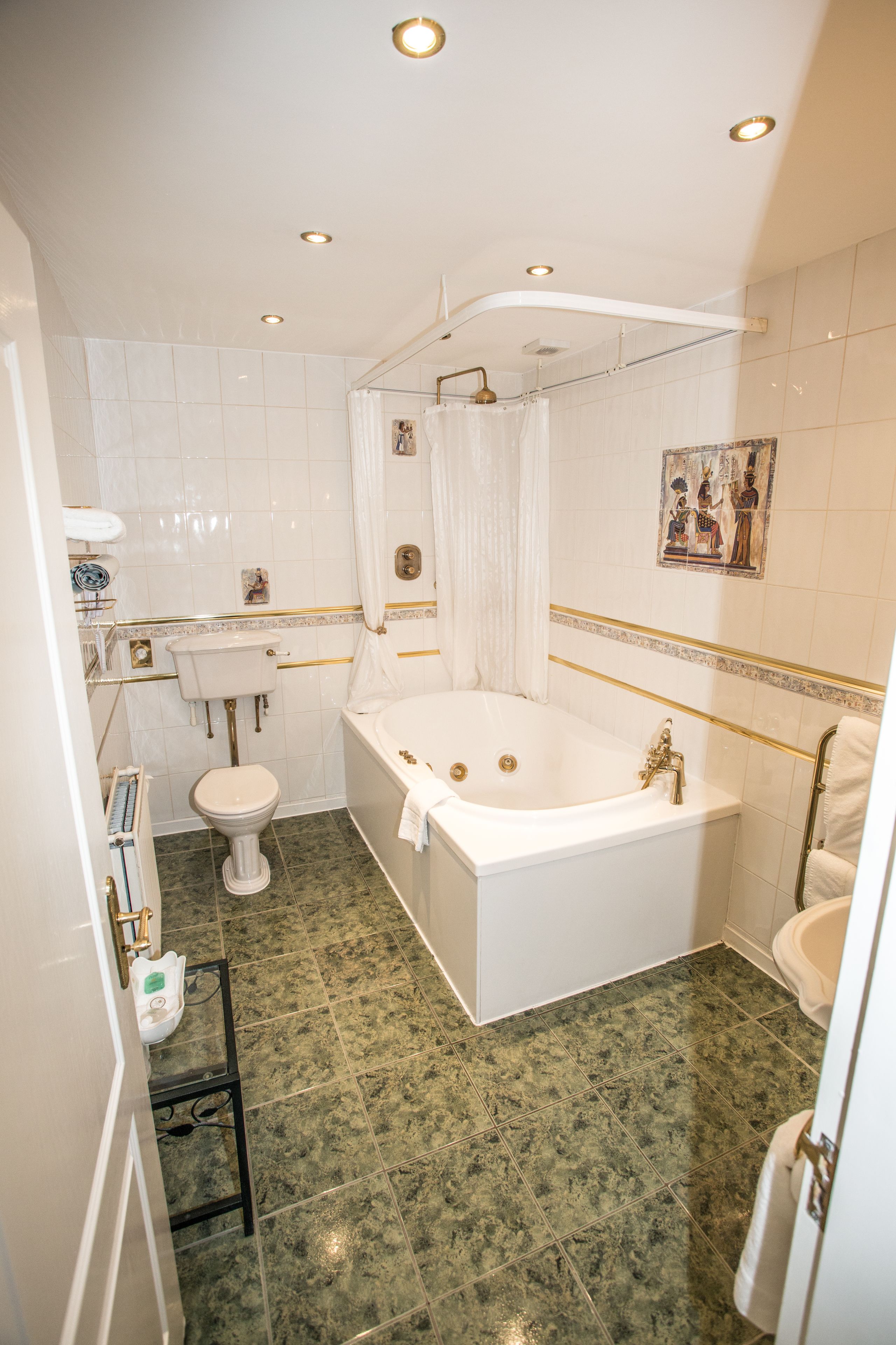presidential suite | bathroom | combined shower/bathtub, jetted bath, free toiletries, towels