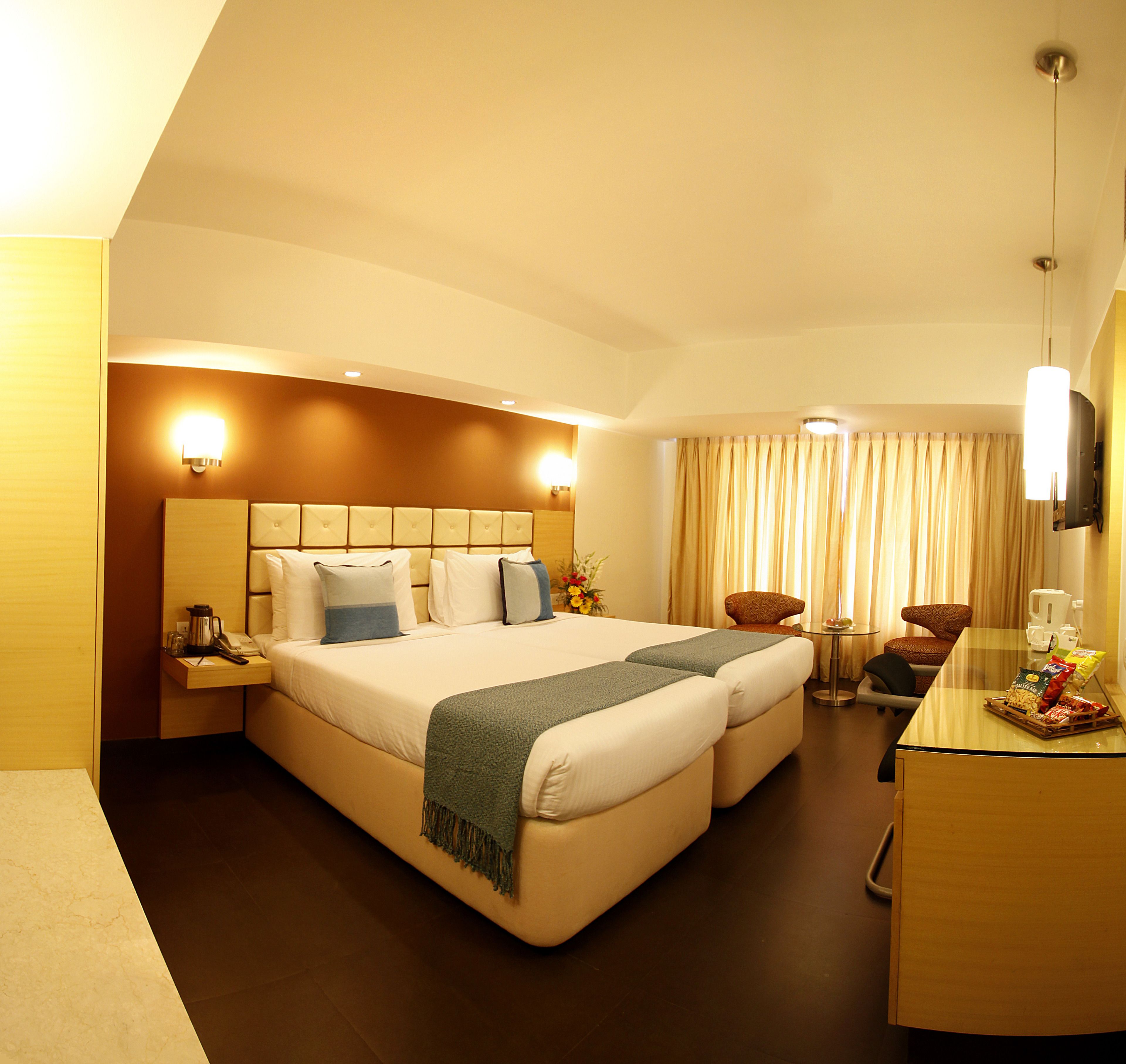 Premium Room, 2 Single Beds | Living area | 21-inch LED TV with cable channels, TV