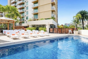 Outdoor pool, open 9:00 AM to 9:00 PM, free pool cabanas, pool loungers