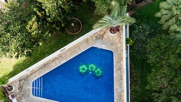 Outdoor pool, open 9:00 AM to 9:00 PM, free cabanas, sun loungers