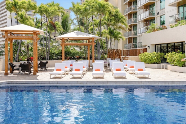 Outdoor pool, open 9:00 AM to 9:00 PM, free cabanas, sun loungers